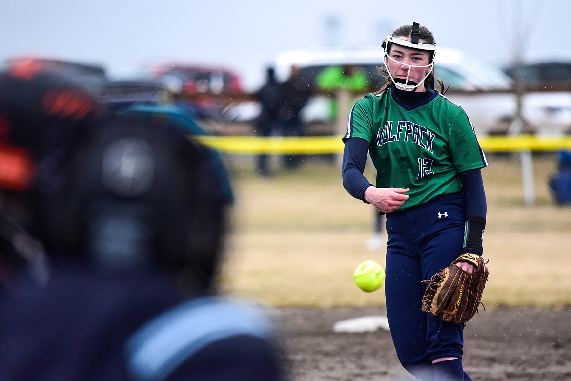 Glacier pitcher Ella Farrell (12) delivers to a Flathead batter in the third inning at Glacier High School on Thursday, April 21. (Casey Kreider/Daily Inter Lake)