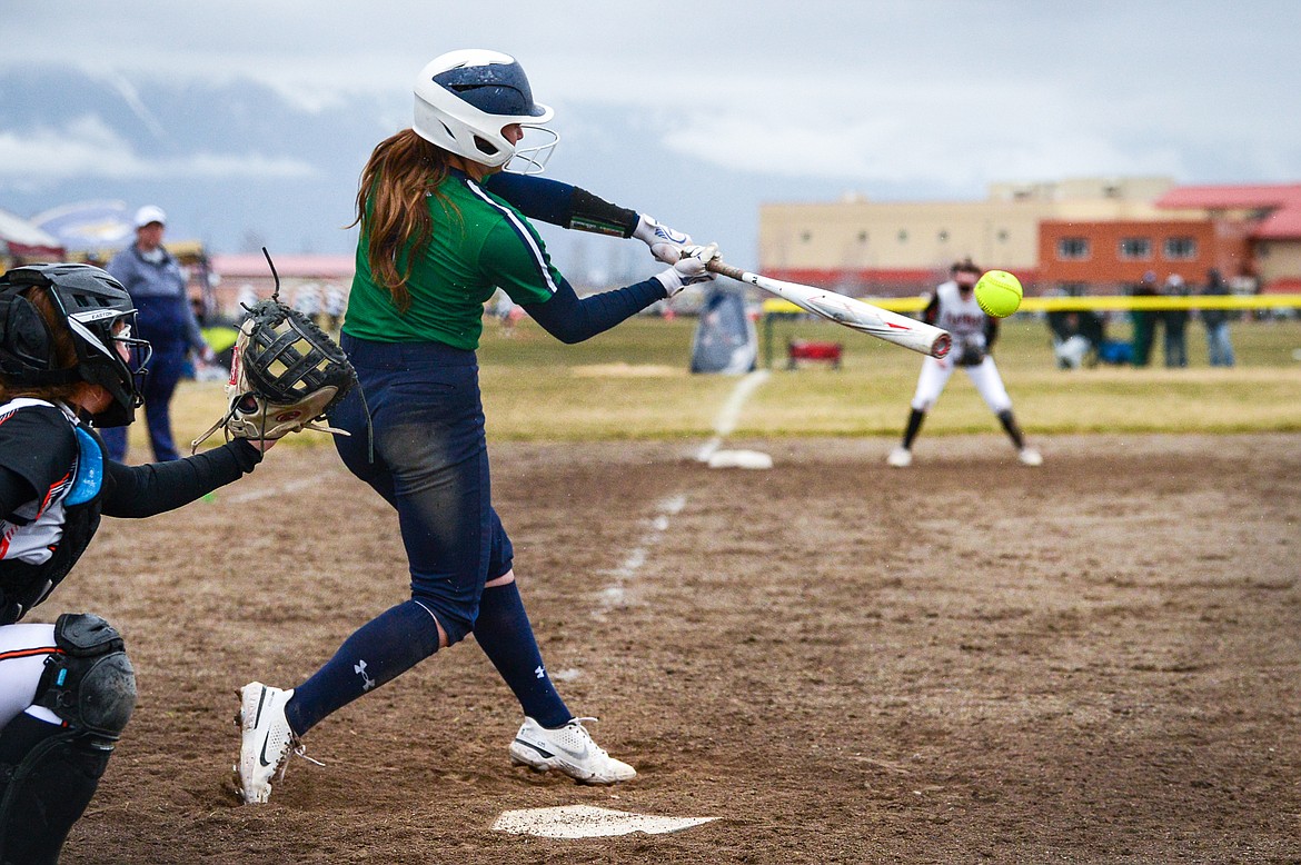 Glacier's Sammie Labrum (1) connects on a two-run home run in the second inning against Flathead at Glacier High School on Thursday, April 21. (Casey Kreider/Daily Inter Lake)