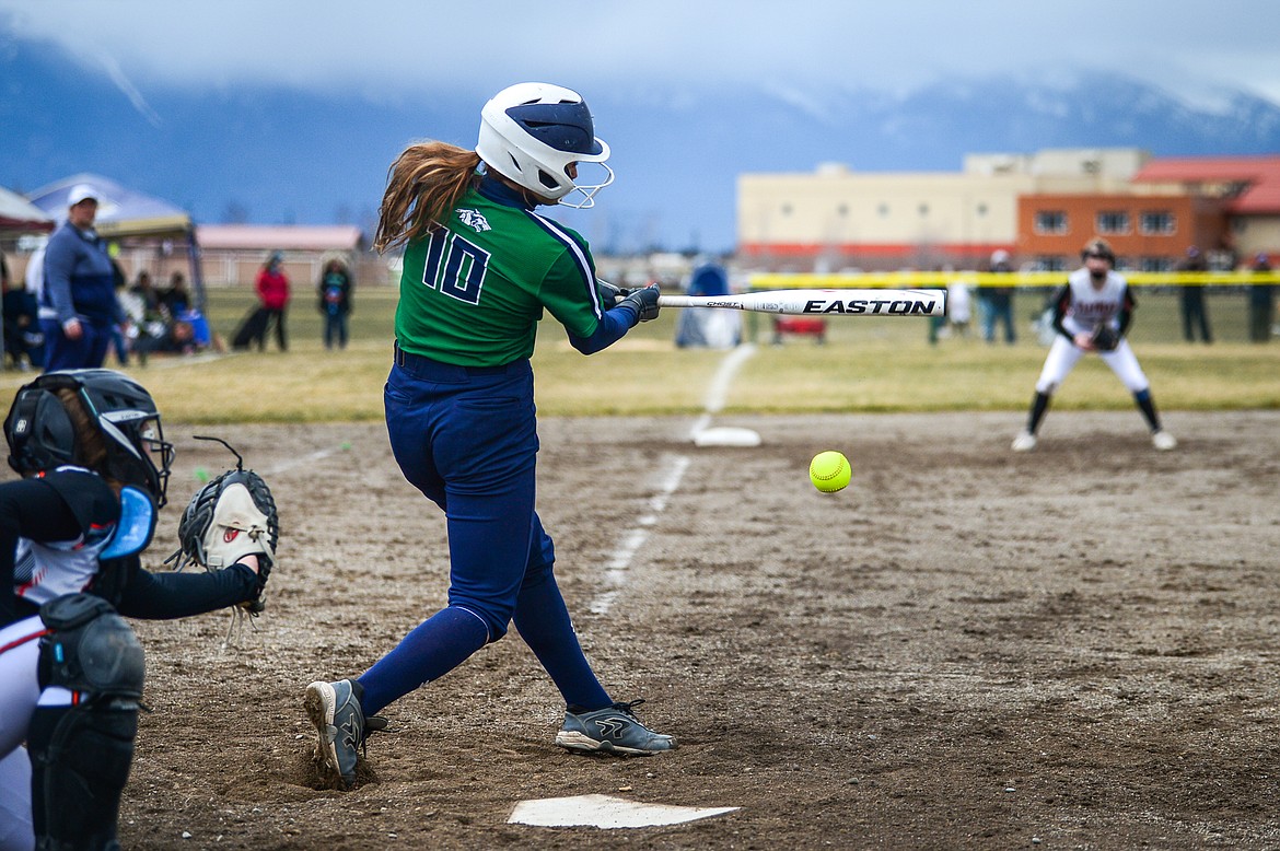 Glacier's Brooklyn Imperato (10) brings in two runs with a double down the third baseline in the first inning against Flathead at Glacier High School on Thursday, April 21. (Casey Kreider/Daily Inter Lake)