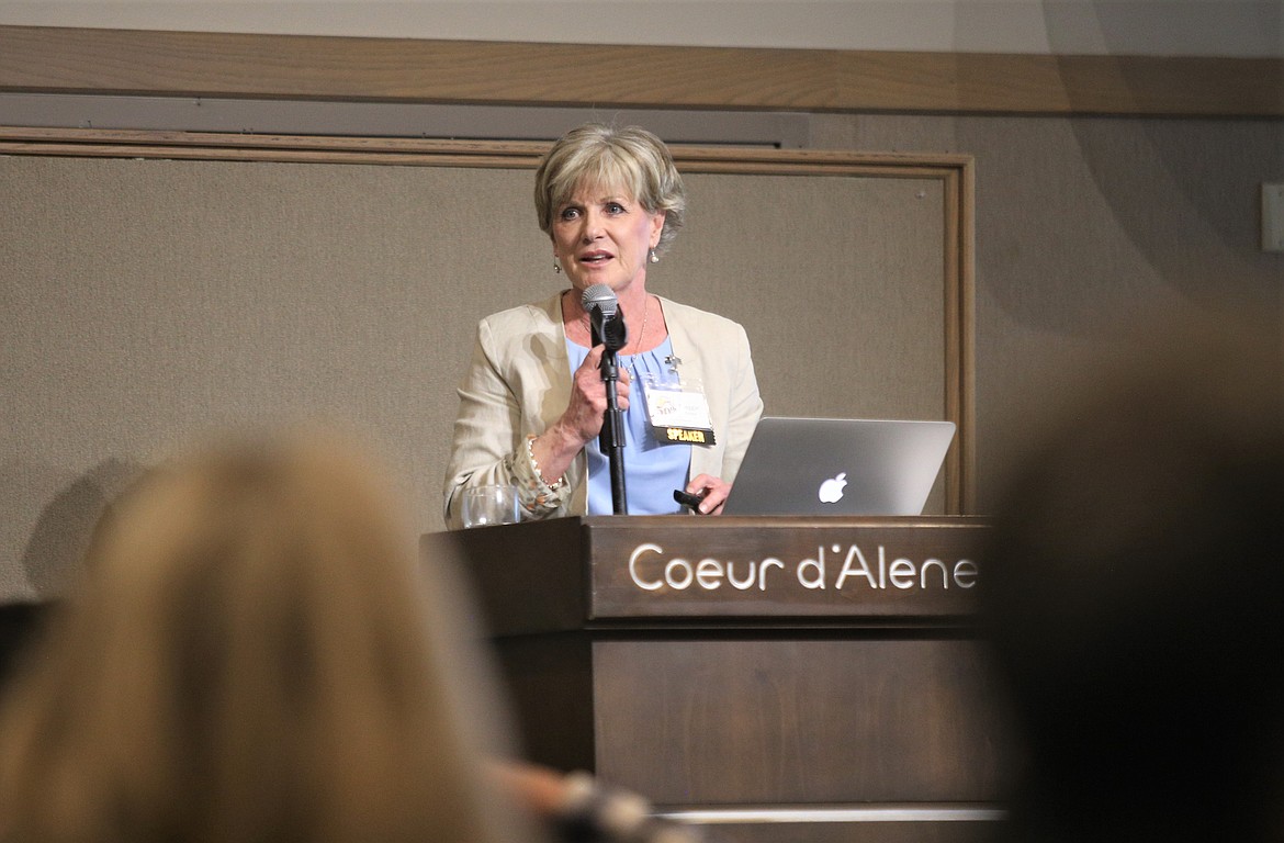 Maggie Lyons with the Regional Housing and Growth Issues Partnership speaks during the North Idaho Building Contractors Association meeting on Wednesday at The Best Western Plus Coeur d'Alene Inn.