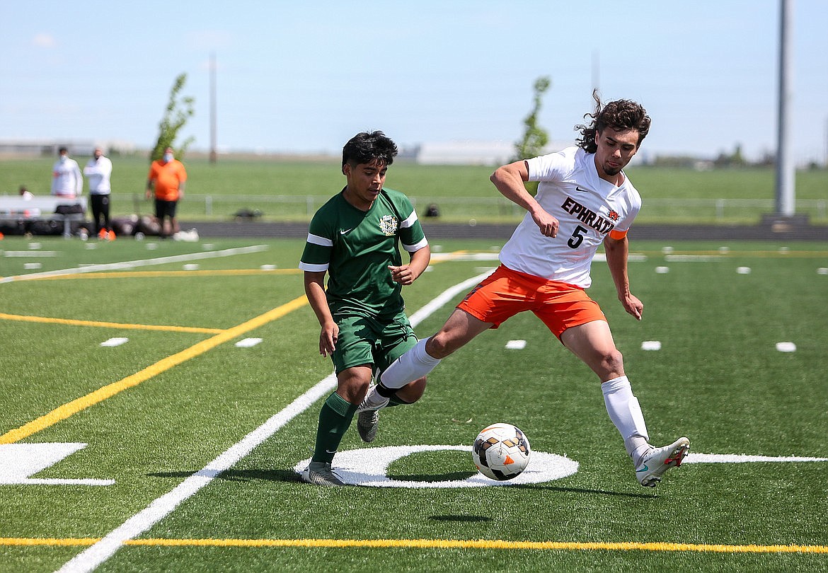 Ephrata High School's Tony O'Neel steals the ball away from Quincy’s Jorge Nunez in the first half of the rivalry matchup on May 1, 2021 in Quincy. This year's Quincy team has been doing well throughout the season.