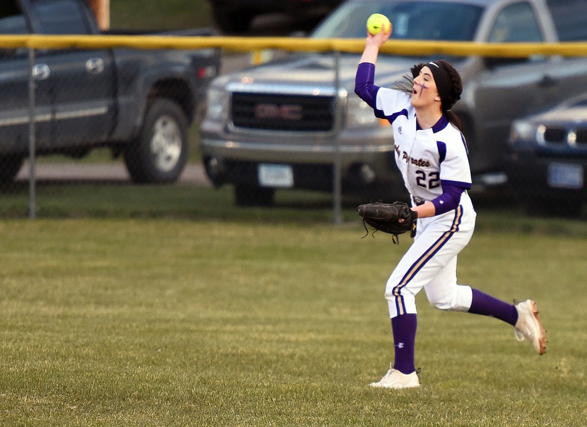 Center fielder Anna Vert fires a throw to the infield against Columbia Falls. (Scot Heisel/Lake County Leader)