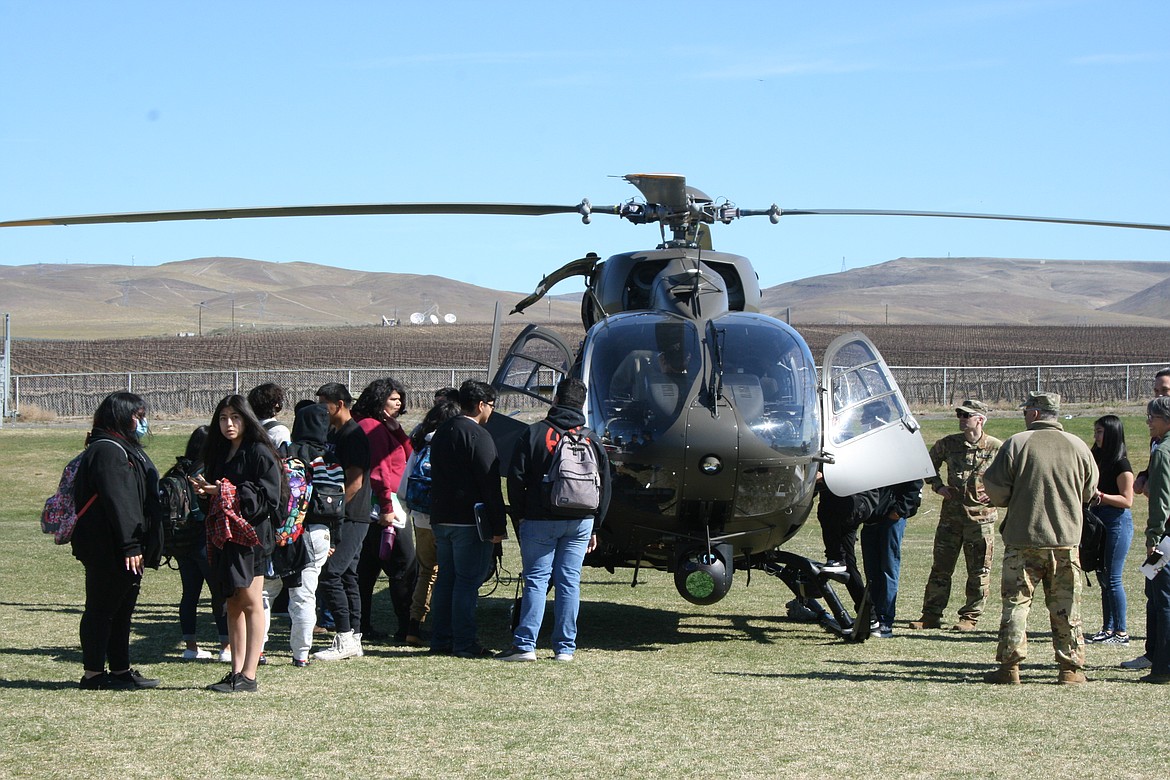 The Washington Air National Guard helicopter that appeared at the Wahluke School District Outdoor Career Fair drew a curious crowd of students.