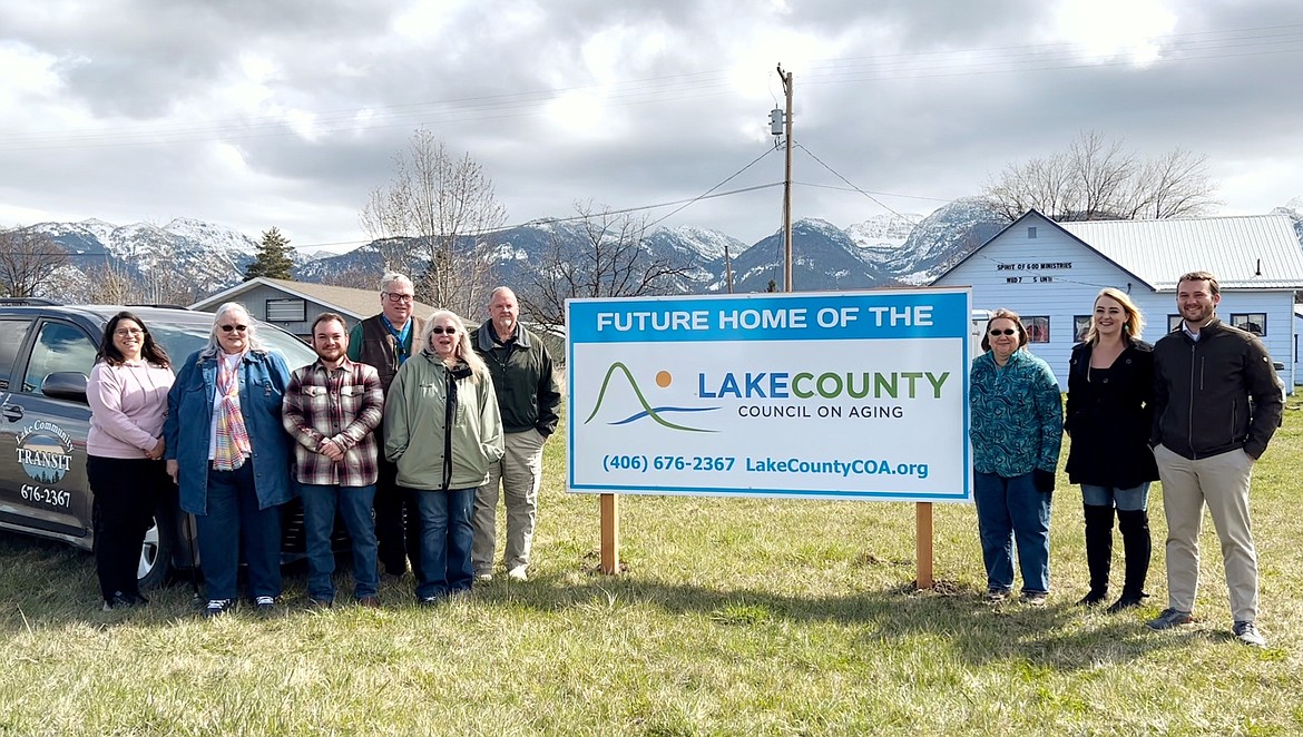 Board members, staff and volunteers of Lake County Council on Aging recently celebrated the start of construction on a new building on Highway 93 in Ronan. The site will provide office space, a conference room and a bus barn for Lake County Community Transit. (Courtesy photo)
