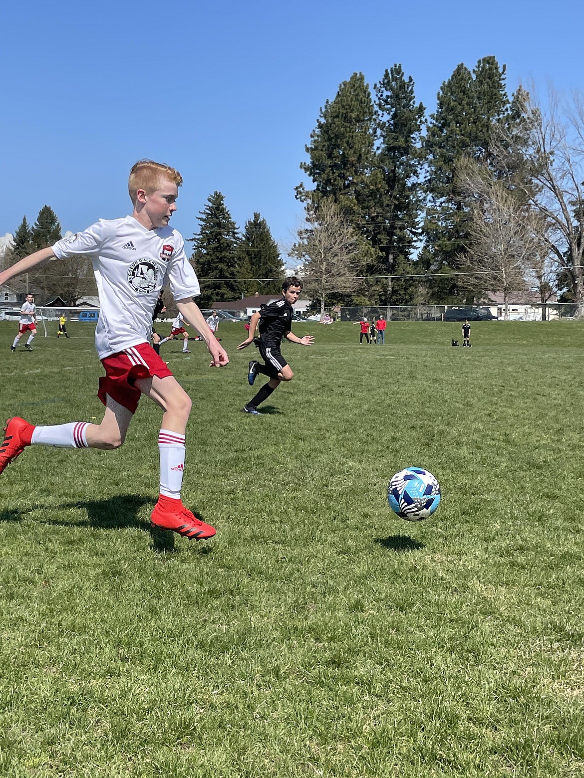 Photo by ABBY FREMOUW
On Sunday, the Timbers North FC 10 Boys White soccer team tied 1-1 with the Cheney Storm FC 09/10 at Canfield Middle School. Mason Cramer scored for the Timbers, and Kellen Anderson was in goal. Pictured above is Luke Nagle of the Timbers.