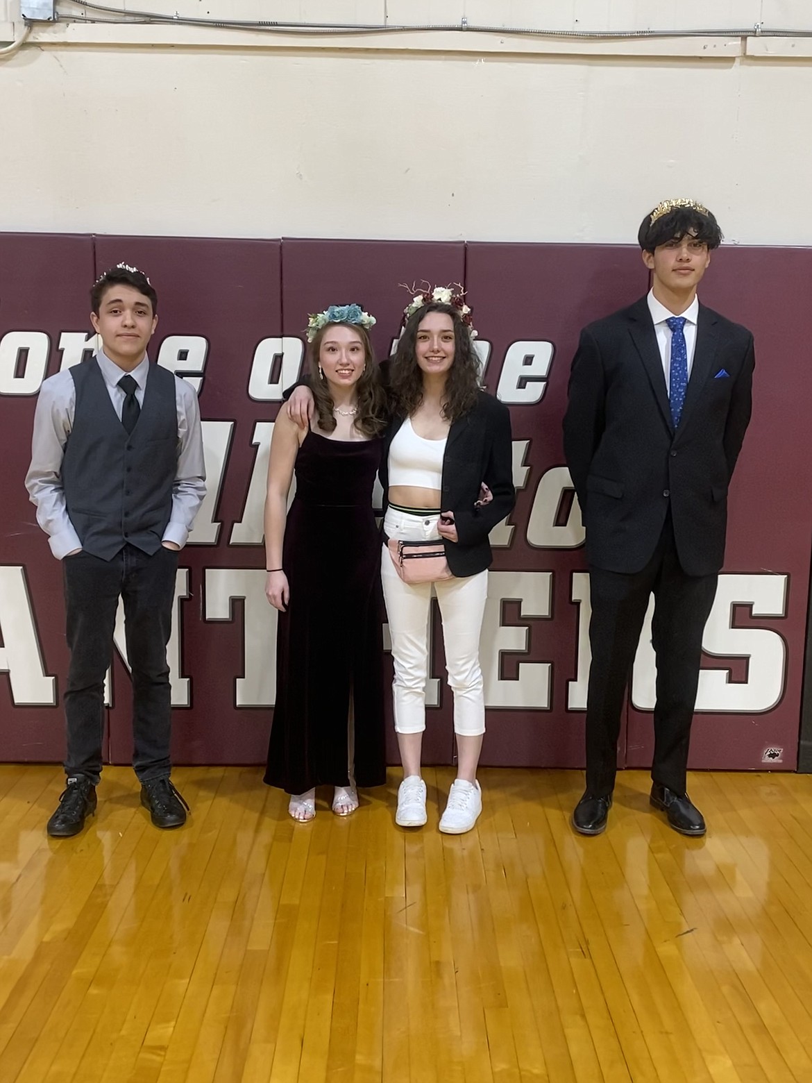 From left, Junior Prince Michael Robitaille, Junior Princess Molia Dao, Senior Queen HayLeigh Notley and Senior King Cy Bay.