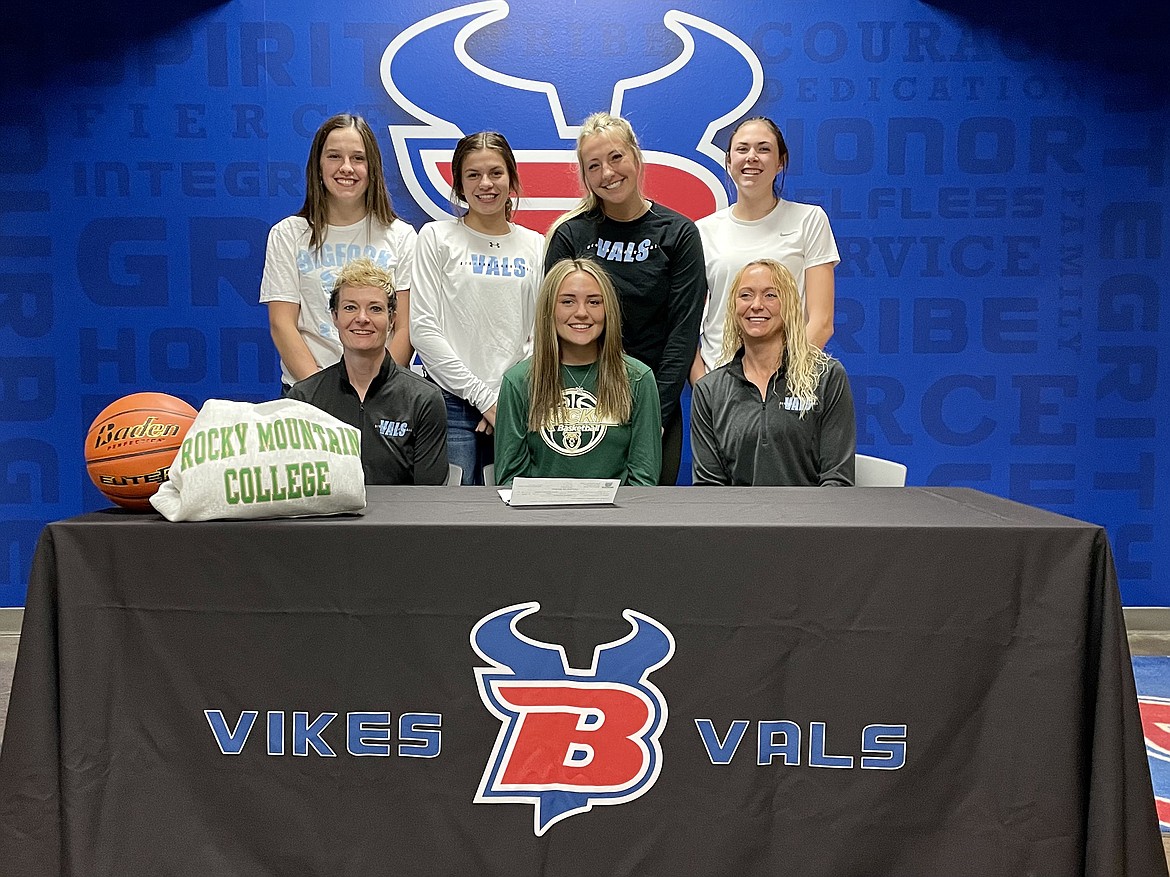 Bigfork's Emma Berreth announced her signing with Rocky Mountain College Monday, April 18, where she will play basketball for the Battlin' Bears next season. A Class B All-State selection her sophomore and senior seasons, Berreth will join a Battlin' Bear squad that went 29-5 last season and advanced to the NAIA national quarterfinals. Joining Berreth (sitting middle) at the signing were teammates Callie Martinz, Ellie Jordt, Scout Nadeau and Braeden Gunlock along with Valkyries assistant coach Brandy Couture and head coach Cortnee Gunlock. (photo provided)