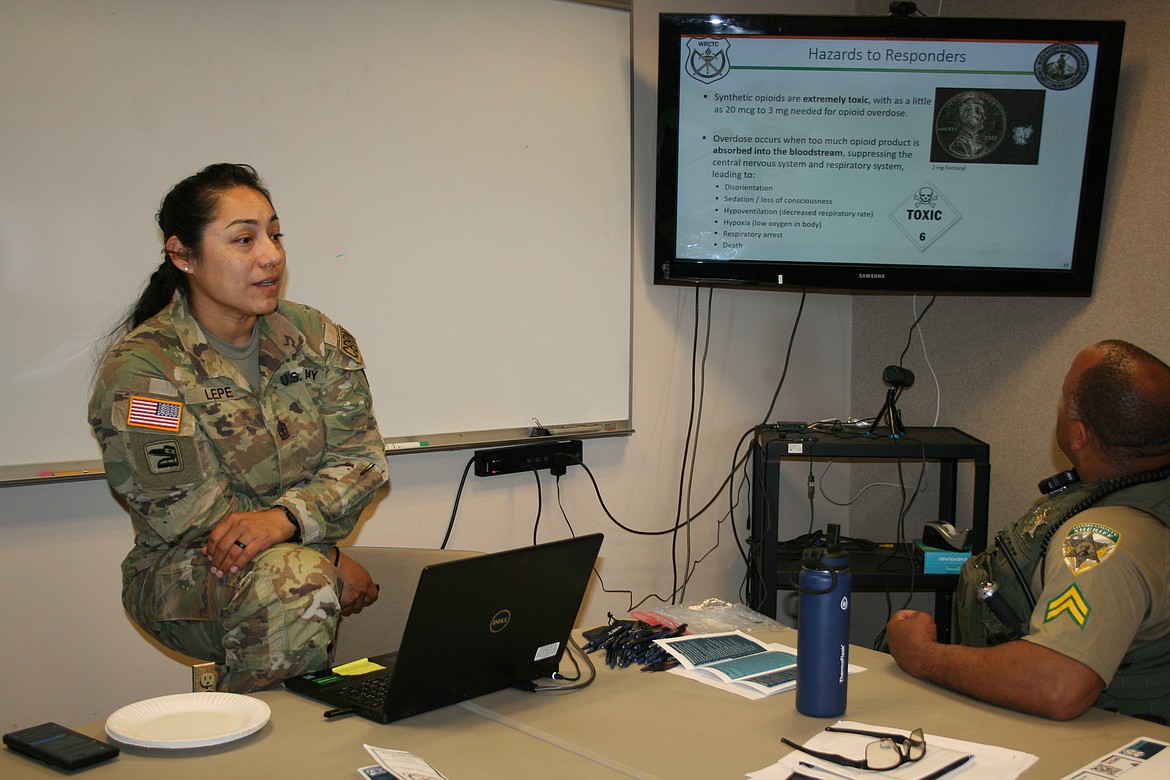 First sergeant Maria Lepe details some of the hazards of fentanyl to first responders and law enforcement officers during training for Adams County Sheriff’s deputies Wednesday.