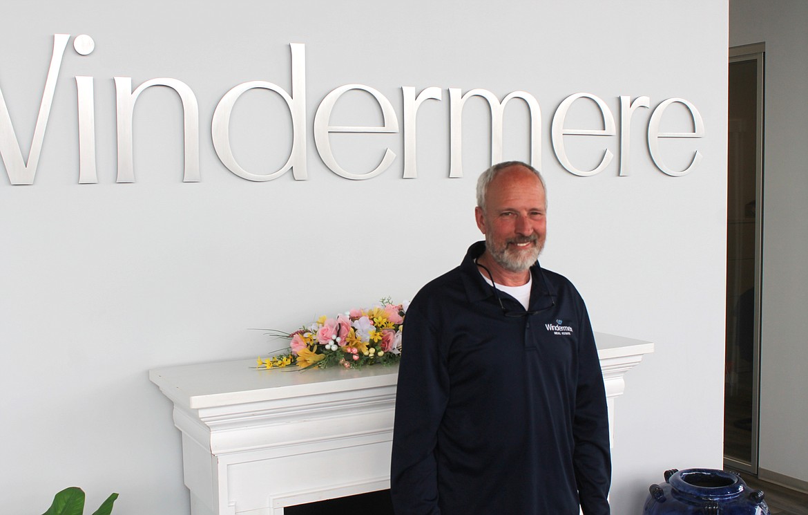 Moses Lake Realtor Kevin Burgess stands in the Windermere Real Estate office in downtown Moses Lake Monday. Burgess was named Washington Realtor of the Year last week at the Washington Realtors Spring Conference.