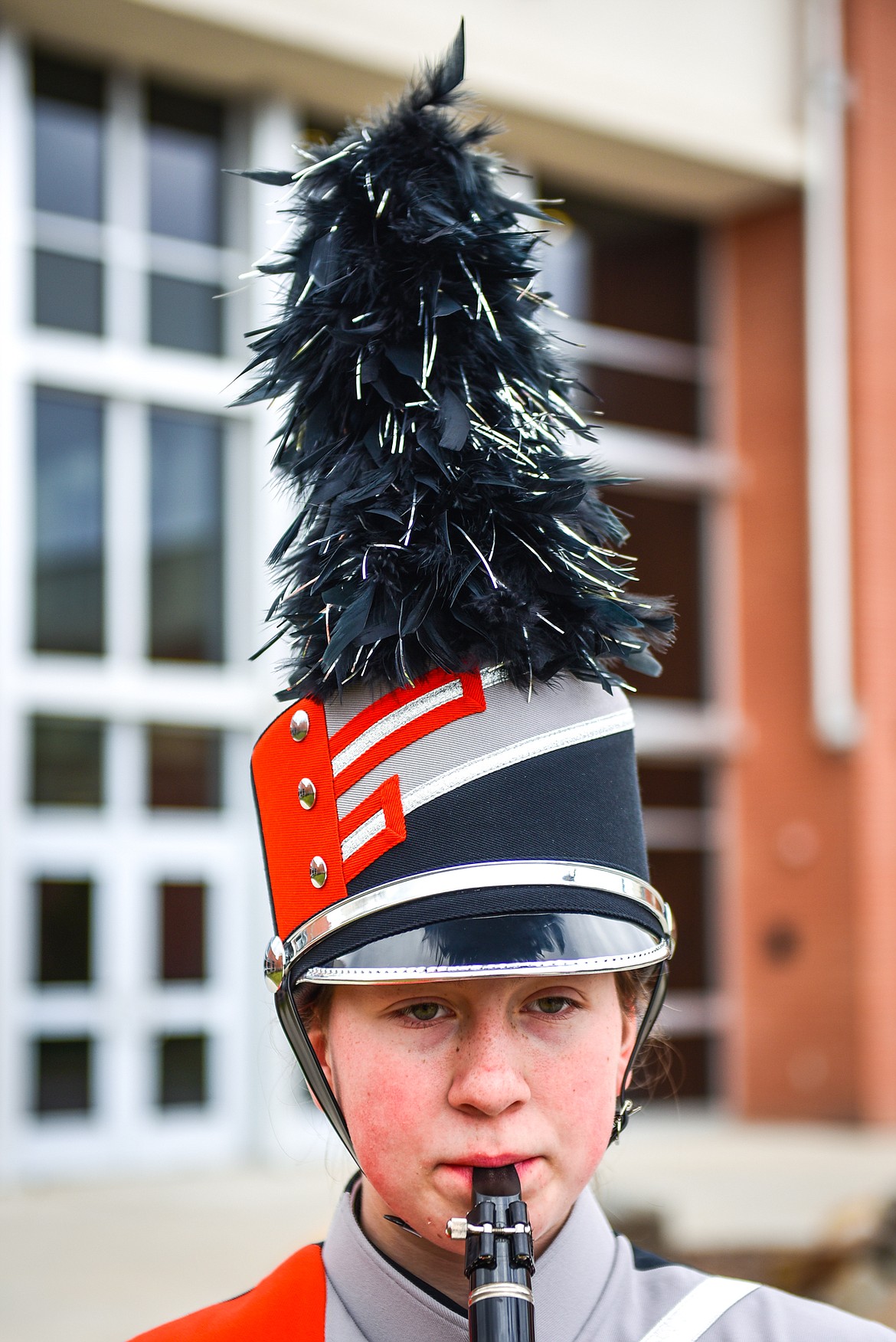 Flathead High School sophomore Sophia Ilin, who plays the clarinet, models the new marching band uniform's shako with a black and silver plume. (Casey Kreider/Daily Inter Lake)