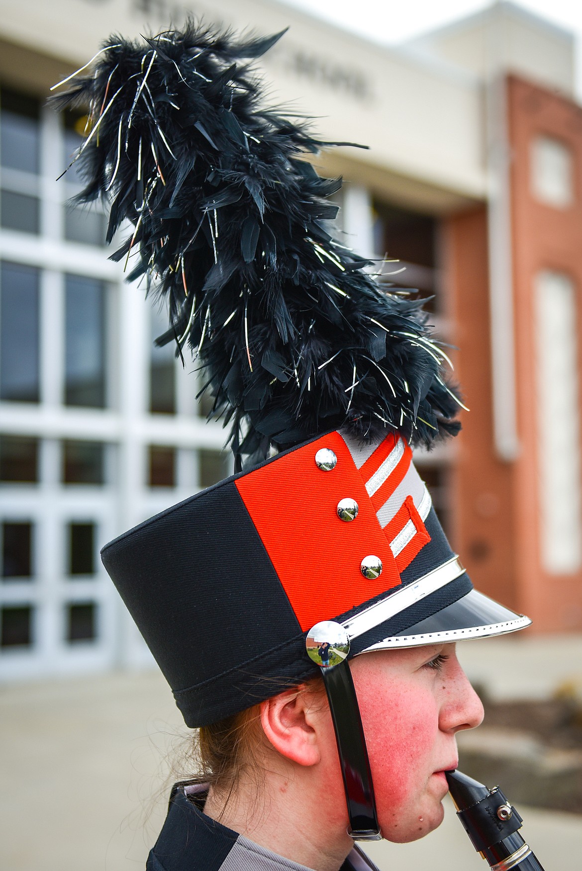 Flathead High School sophomore Sophia Ilin, who plays the clarinet, models the new marching band uniform's shako with a black and silver plume. (Casey Kreider/Daily Inter Lake)