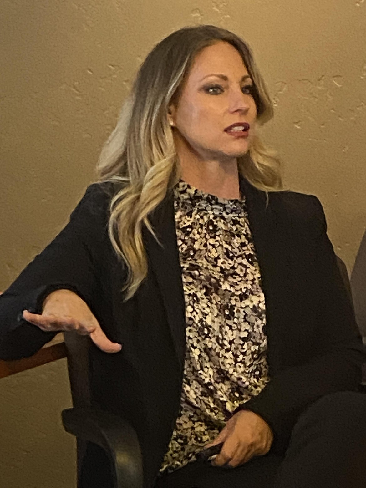 Theresa Whitlock-Wild speaks to the Post Falls Chamber of Commerce Wednesday about the work done by the Matt's Place Foundation co-founded with her husband Matthew, who was diagnosed with ALS in 2015.