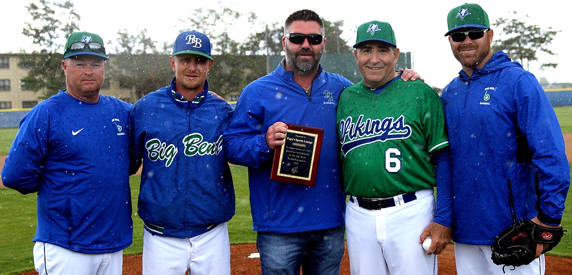 B.J. Garbe (center) with the late Pete Doumit (in green) during Doumit’s last game as Big Bend Community College head baseball coach in 2017. Garbe credited Doumit with teaching him a lot, both on and off the field. Also pictured are (from left) BBCC then-coaches Craig Carter, Jameson Lang and Ryan Doumit.