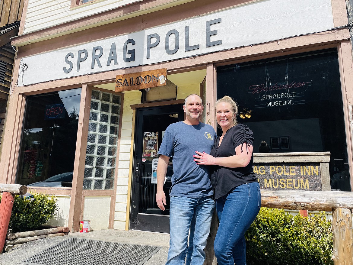 New Sprag Pole owners Eric and Kippie Corta stand outside the near century-and-a-half old building in Murray. The Sprag Pole will be opening up with regular hours beginning in May.