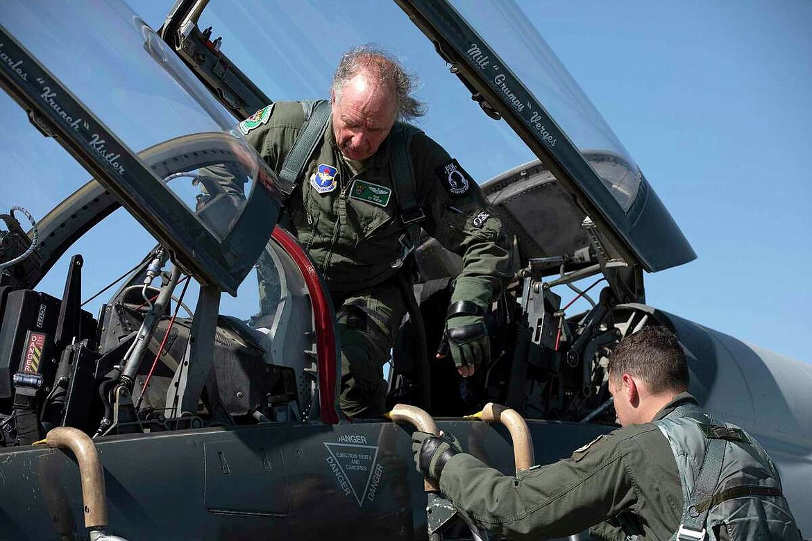 Retired Maj. Theodore “Ted” Sienicki, who was shot down over North Vietnam and was a prisoner of war, climbs out of a T-38C after his cermonial “fini” flight at Joint Base San Antonio-Randolph on March 24.