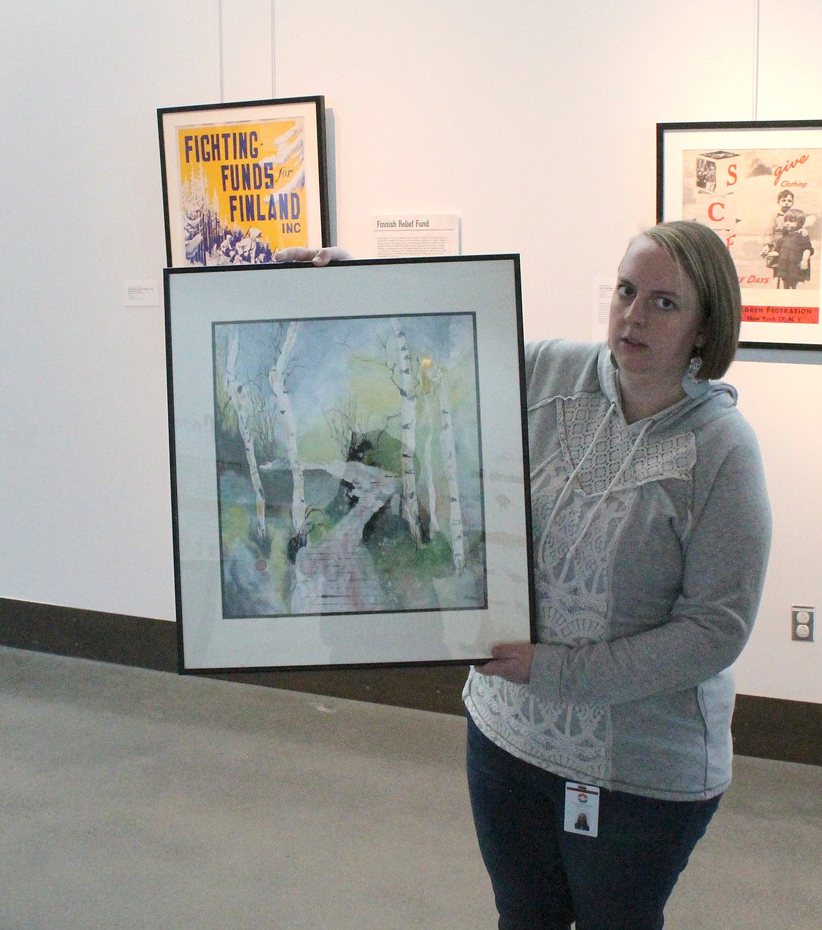 Moses Lake Museum & Art Center Artistic Coordinator Angela Hunt shows off “A Walk on the Wild Side,” by Moses Lake artist Judy Kalin. The watercolor painting will be part of “A Matter of Perspective” on display at the museum starting Friday.
