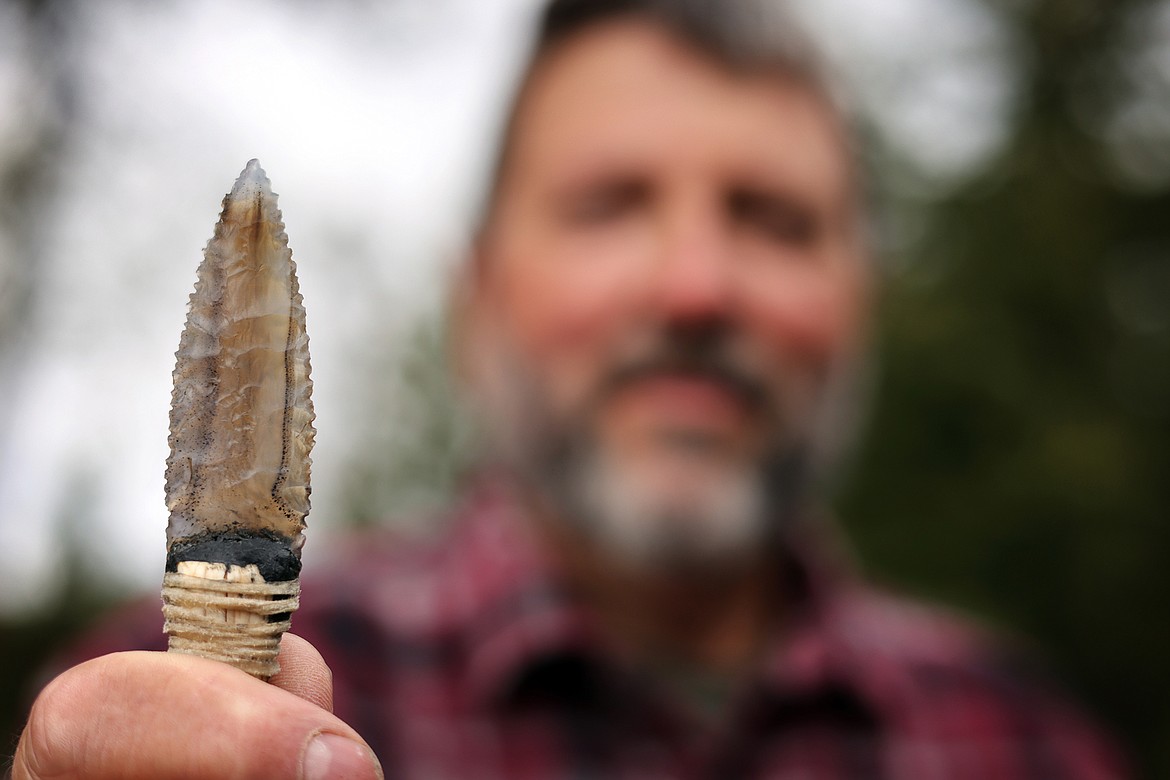 Kila's Tom Blais uses traditional stone and bone tools to produce stone arrowheads, knives and more. (Jeremy Weber/Daily Inter Lake)
