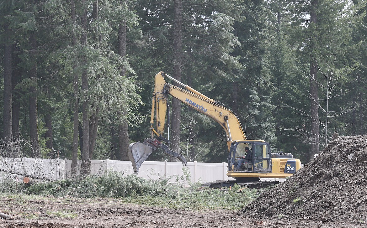 Heavy equipment activity is buzzing at Government Way and Lancaster Road in Hayden as work crews clear land in preparation for the construction of the Hayden Canyon development. Houses will begin to appear late this summer.