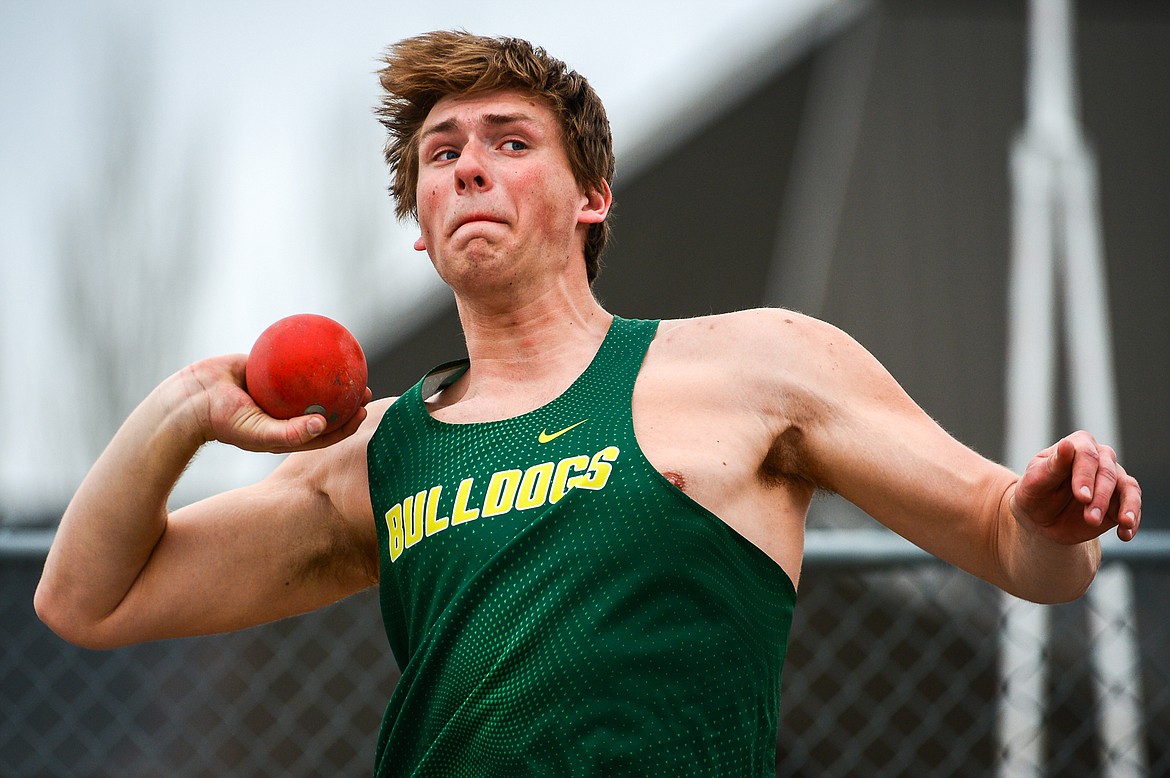 Whitefish's Talon Holmquist launches a throw of 50 feet 1 inch in the boys shot put at the Whitefish ARM Invitational on Saturday, April 30. (Casey Kreider/Daily Inter Lake)
