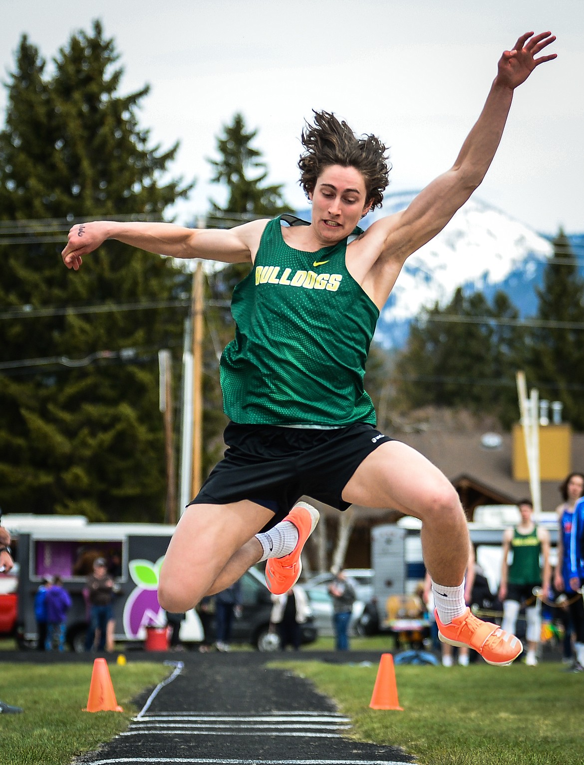 Whitefish's Gabe Menicke competes in the boys triple jump at the Whitefish ARM Invitational on Saturday, April 30. (Casey Kreider/Daily Inter Lake)