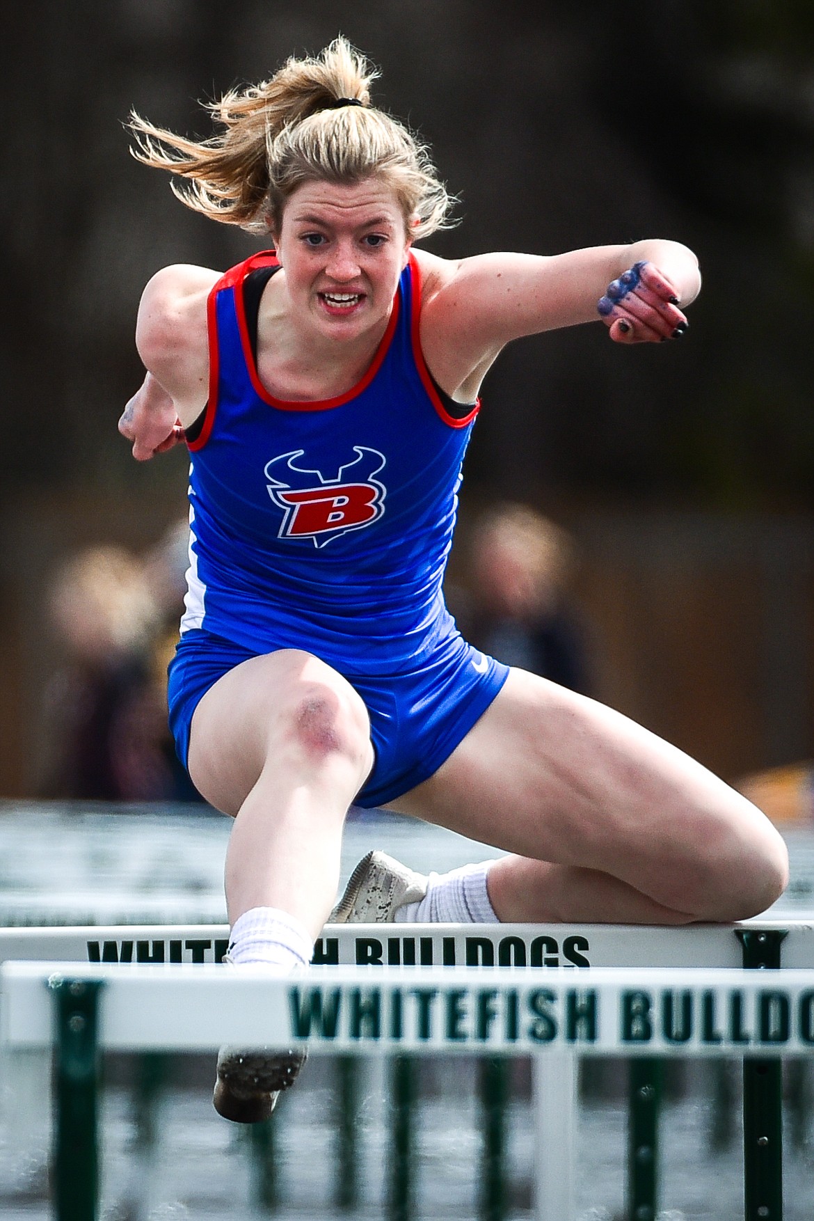 Bigfork's Lily Tanko competes in the girls 100 meter hurdles at the Whitefish ARM Invitational on Saturday, April 30. (Casey Kreider/Daily Inter Lake)