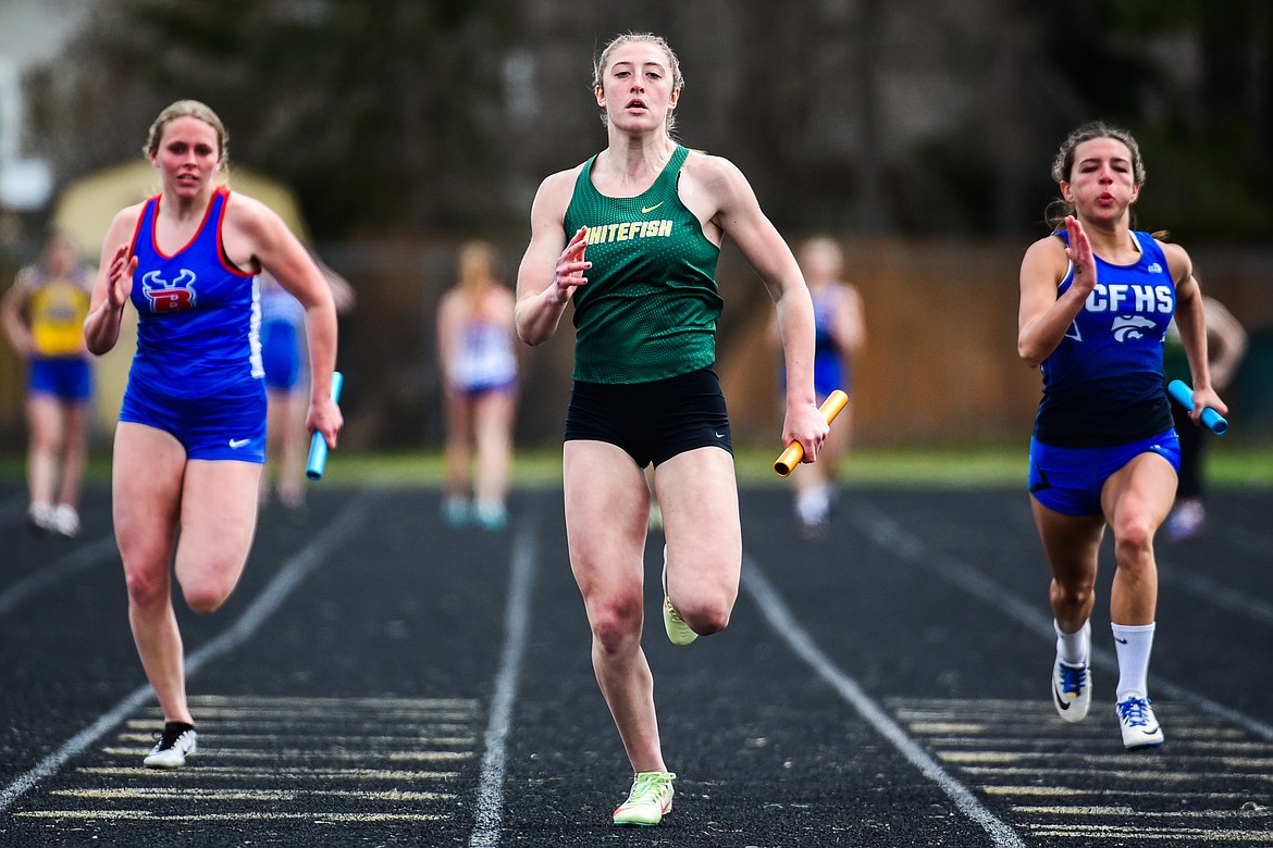 Whitefish' Brooke Zetooney heads to the finish line in the girls 4x100 meter relay at the Whitefish ARM Invitational on Saturday, April 30. Zetooney anchors the team with Rachael Wilmot, Erin Wilde and Hailey Ells. (Casey Kreider/Daily Inter Lake)