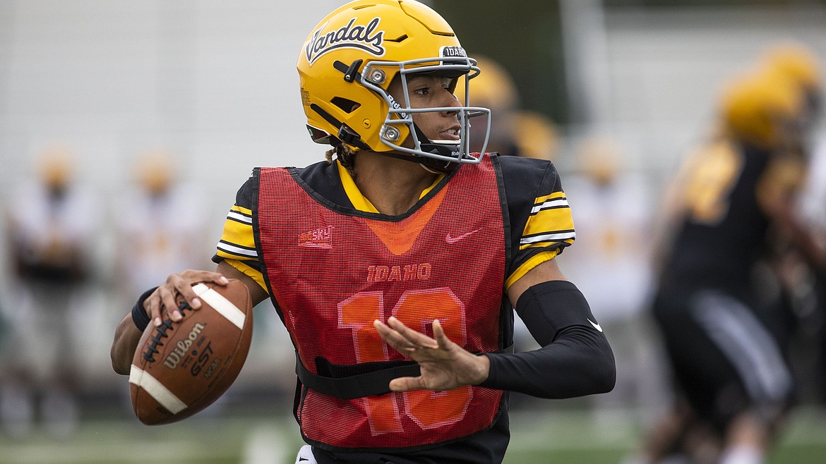 DARIN OSWALD/The Idaho Statesman
Idaho sophomore quarterback Gevani McCoy looks to pass on the run during the Vandals' annual spring football game, played this year in the Treasure Valley on Saturday at Eagle High.