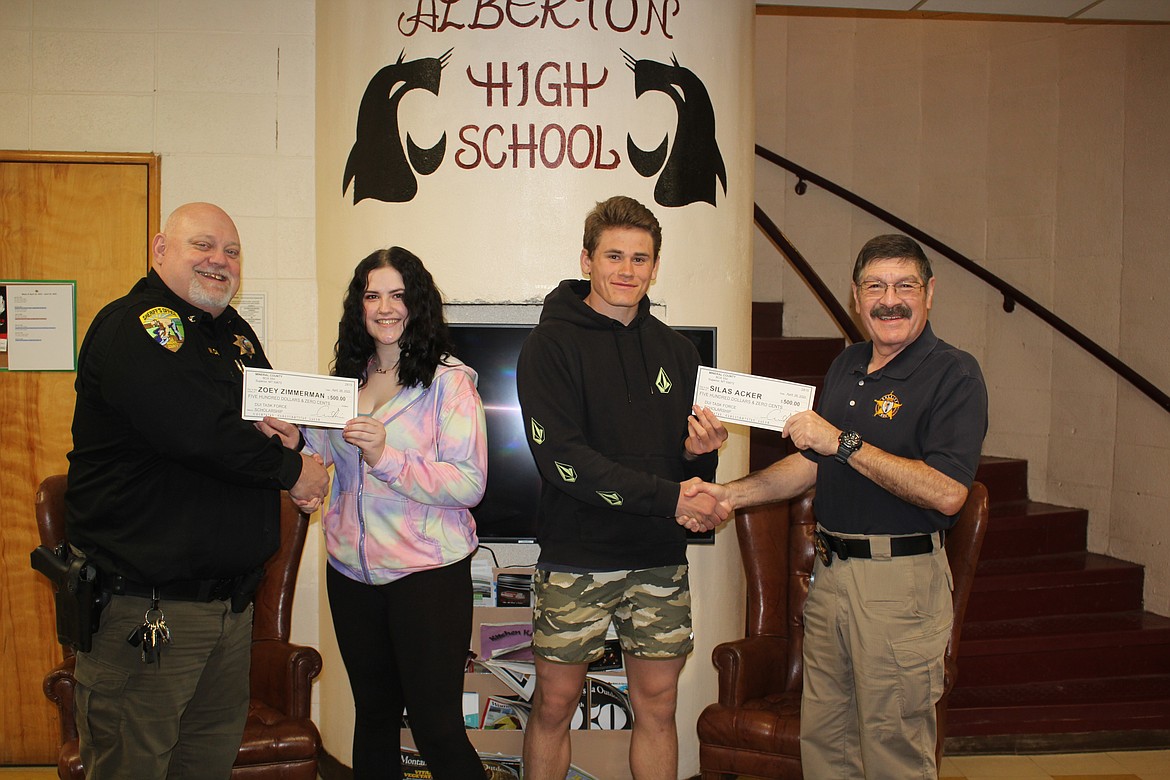 Undersheriff Wayne Cashman. Zoey Zimmerman and Silas Acker were both DUI Task Force scholarship champs from Alberton High School, and DUI Task Force Coordinator, Ernie Ornealas.