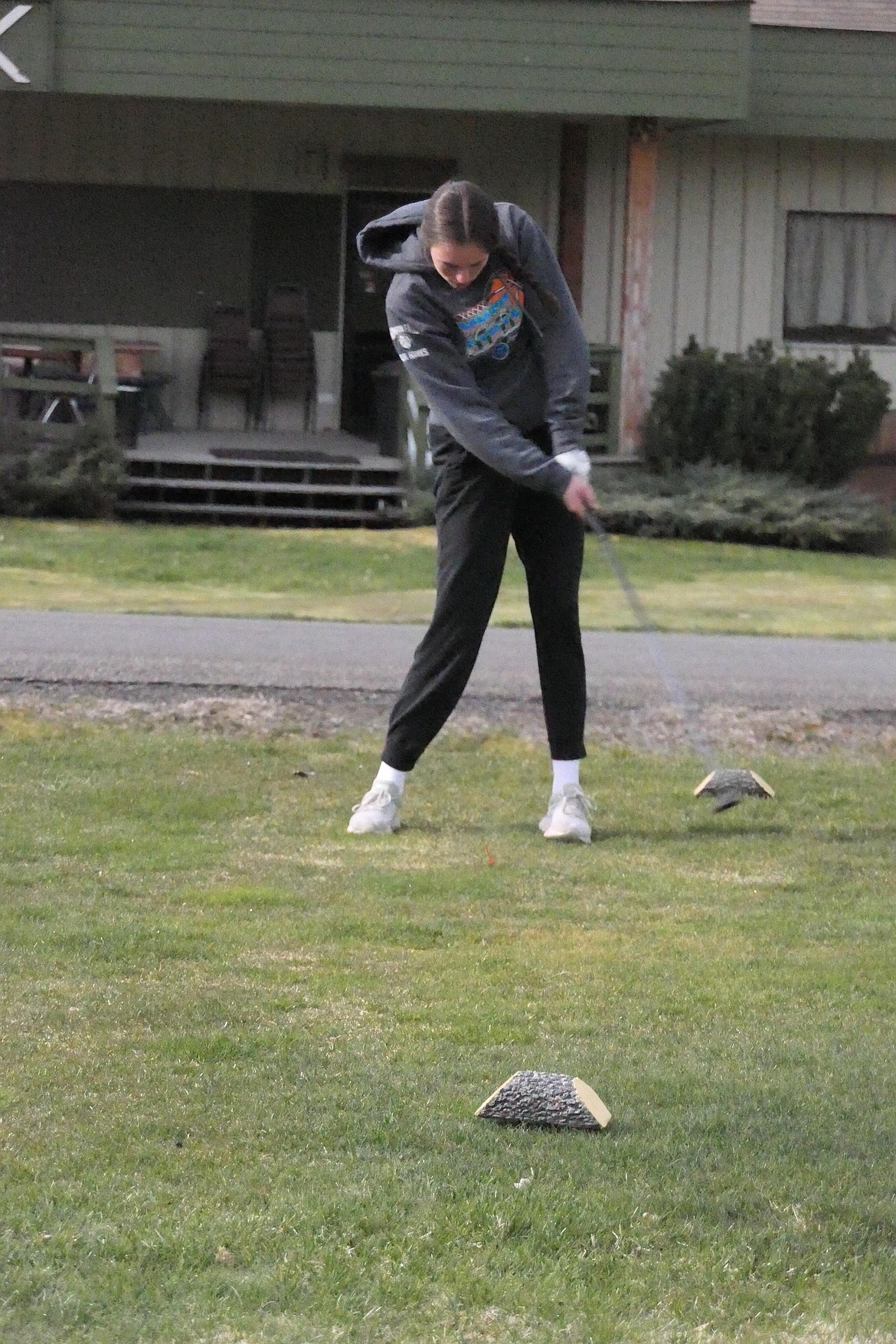 Thompson Falls standout Ellie Baxter tees off on the first hole of the St. Regis tourney this past week.  She shot a 91 to win the girls individual title. (Chuck Bandel/VP-MI)