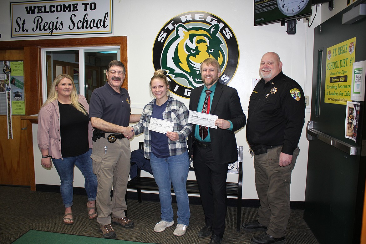 yler Cheesman, School Counselor. Ernie Ornealas, DUI Task Force Coordinator. Baylee Pruitt, Scholarship recipient. Derek Larson, St. Regis School Superintendent and Undersheriff Wayne Cashman. Missing is Carter Jasper who also was awarded a $500.00 scholarship from the DUI Task Force.