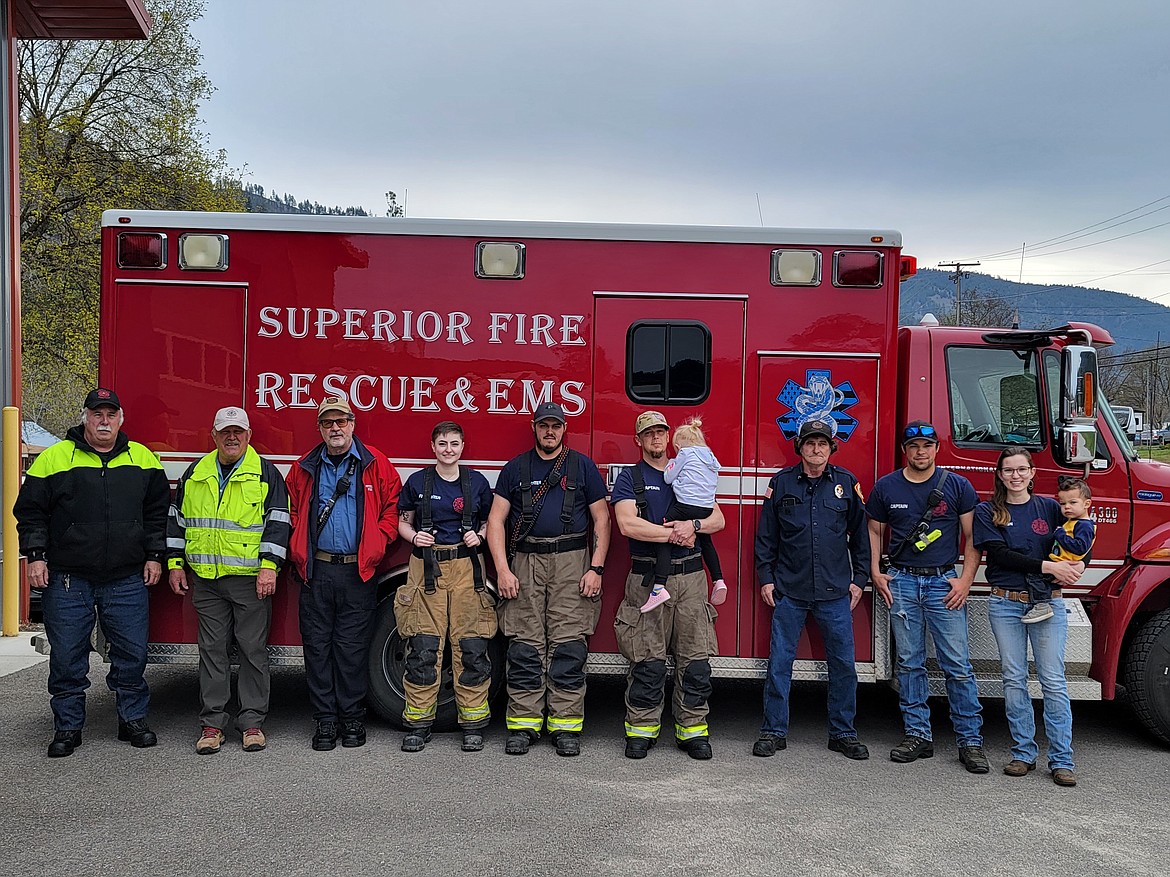 The recently commissioned Quick Response Unit gathers out front of the Superior Volunteer Fire Department. From left to right, Doug Pugh, Steve Temple, Dan Clemts, Kristina Scott, Kyle Zenor, Scott Dodd with daughter Eloise, Donald Mellen, Josh Pecora and Heather Pecora with son Mason. (Photo courtesy/Heather Pecora)