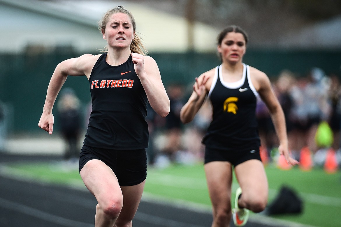 Flathead's Kelcey Copping nears the finish line in the girls 100 meter dash during a triangular meet with Missoula Hellgate and Missoula Sentinel at Legends Stadium on Tuesday, May 3. (Casey Kreider/Daily Inter Lake)