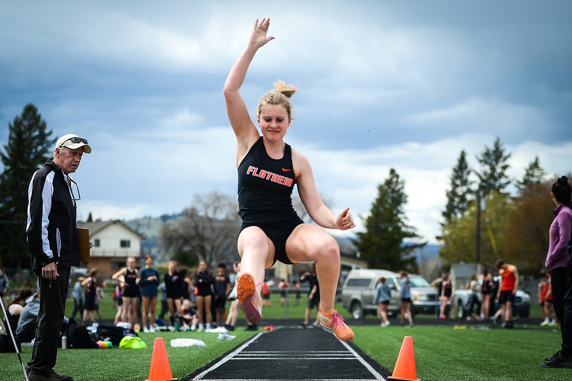 Flathead's Afton Wride competes in the girls triple jump during a triangular meet with Missoula Hellgate and Missoula Sentinel at Legends Stadium on Tuesday, May 3. (Casey Kreider/Daily Inter Lake)