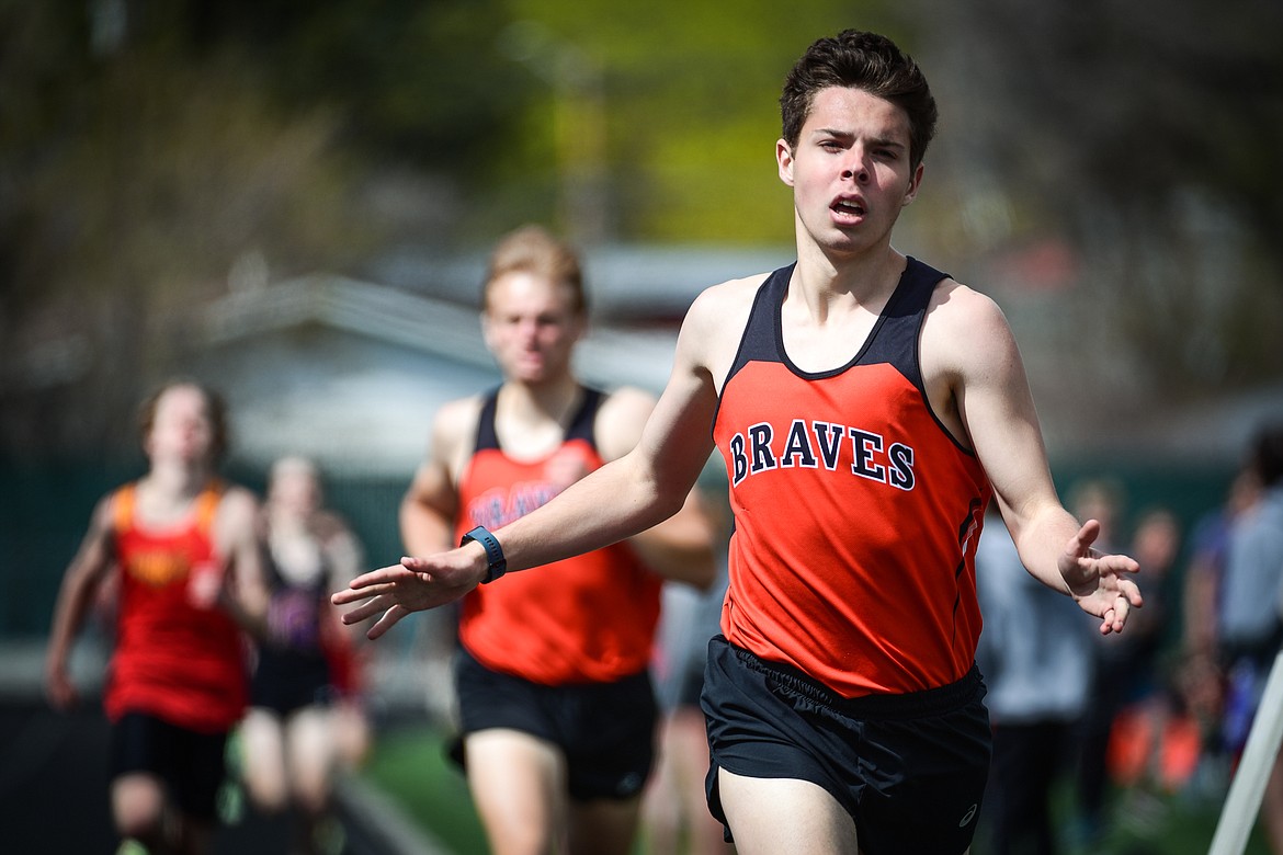 Flathead's Gabe Felton finishes first in the boys 800 meter run during a triangular meet with Missoula Hellgate and Missoula Sentinel at Legends Stadium on Tuesday, May 3. (Casey Kreider/Daily Inter Lake)
