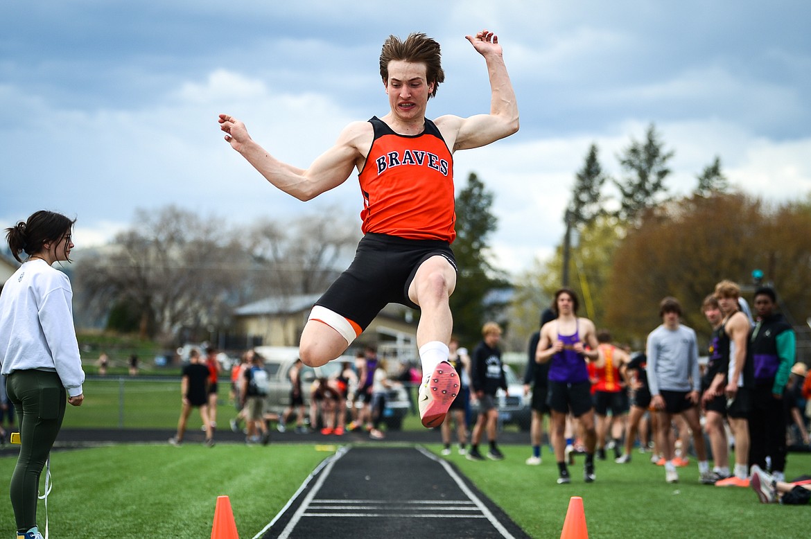 Flathead's Dylan Zink competes in the boys long jump during a triangular meet with Missoula Hellgate and Missoula Sentinel at Legends Stadium on Tuesday, May 3. (Casey Kreider/Daily Inter Lake)