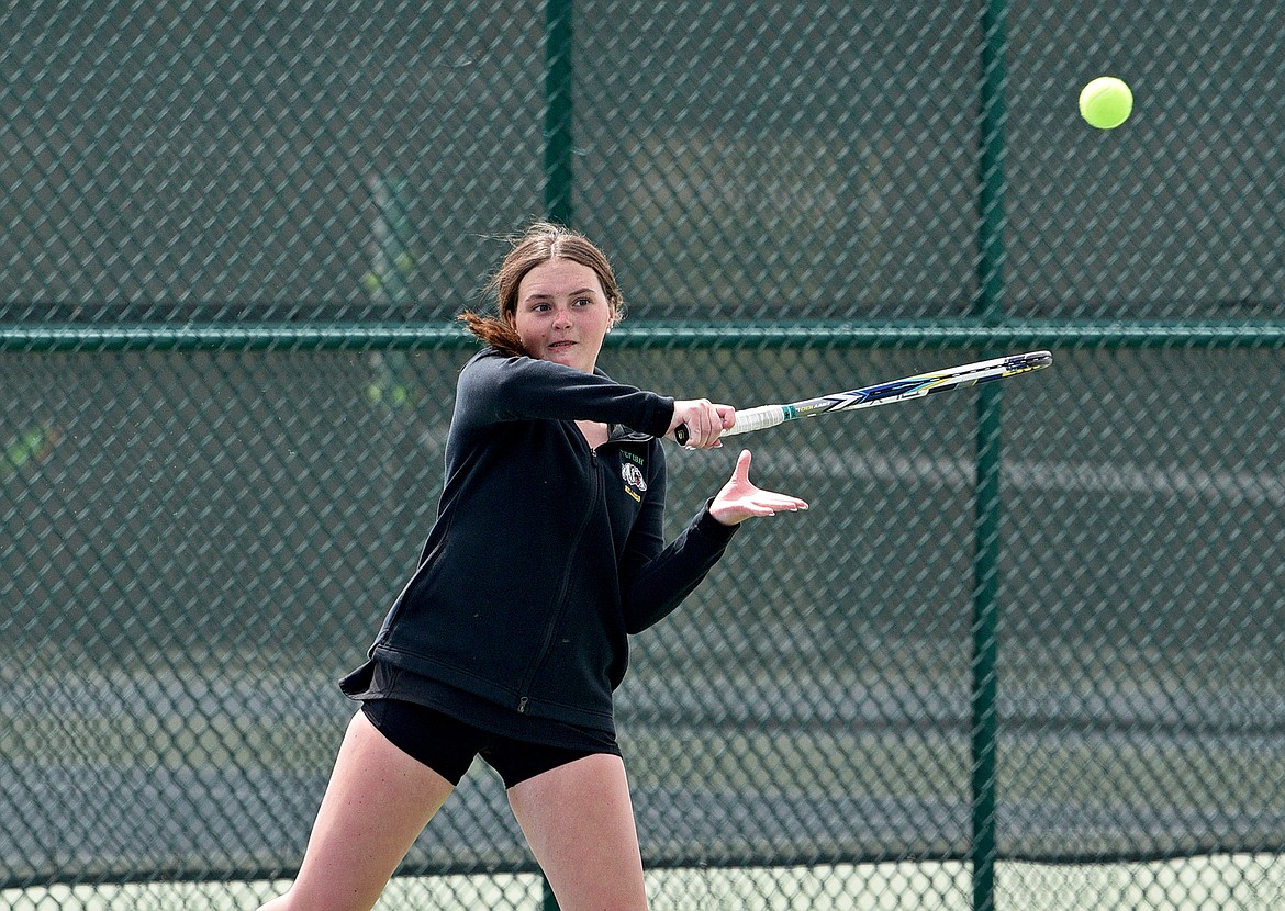 Whitefish's Addie Oehlerich plays in a doubles match against Flathead on Thursday at FVCC. (Whitney England/Whitefish Pilot)