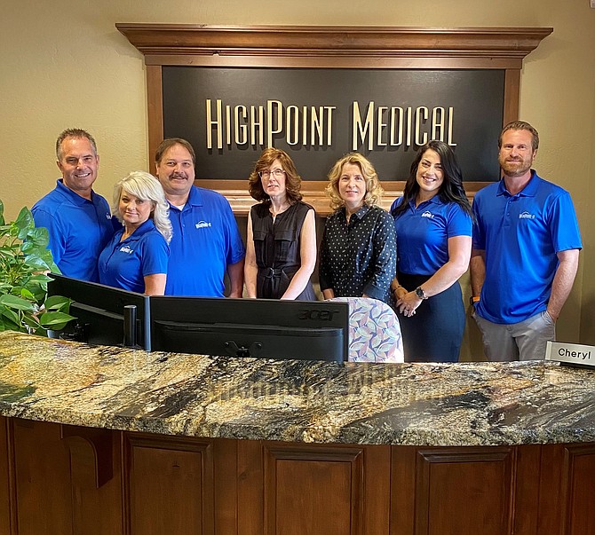 From left: Skip and Beth Meyer, Hal McConnel, Kayron Rhuman, Lori Slehofer, Shawna Biggerstaff and Destry Earling at the Highpoint Medical IT office.