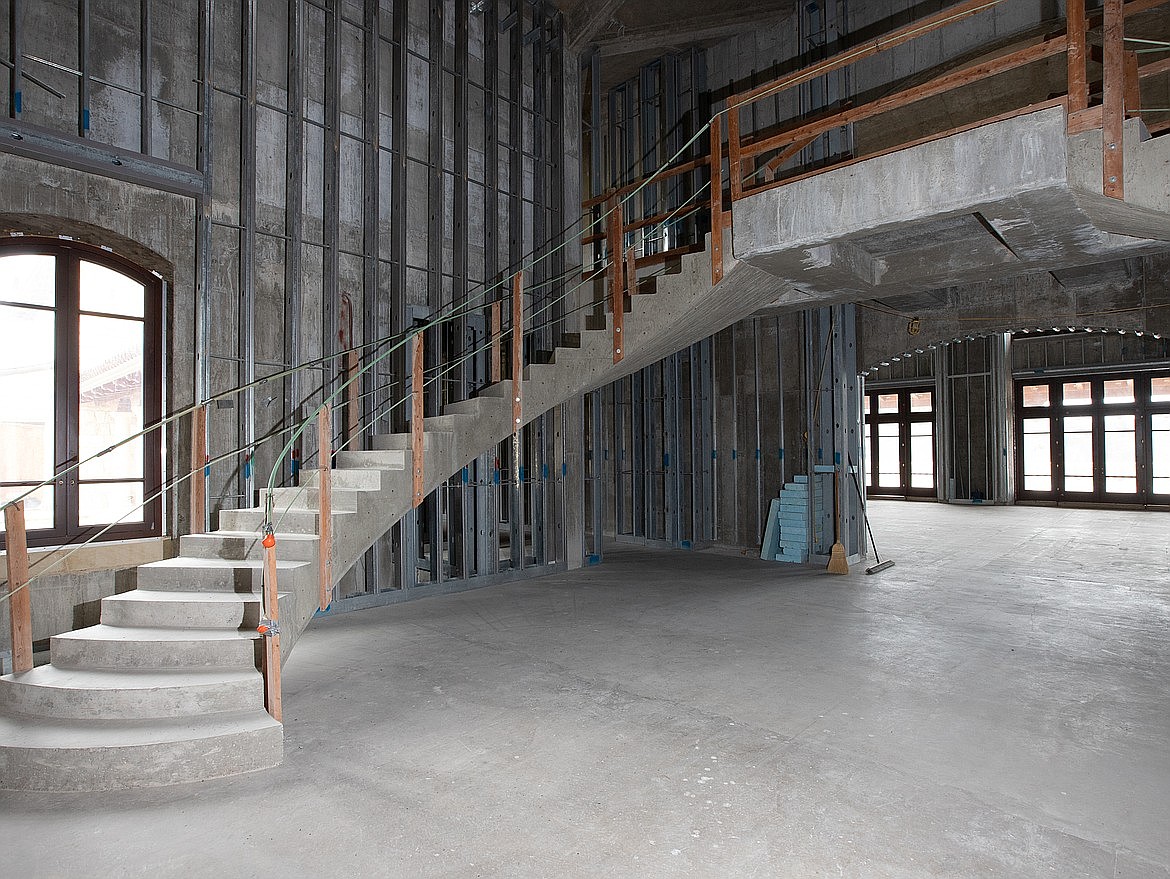 Cromwell Island in Flathead Lake is up for sale at $72 million. In the main house, the twin symmetrical and suspended staircases inside the main entrance are inspired by the hanging staircase in the Nathaniel Russell House in Charleston, South Carolina. (Photo courtesy of Bill McDavid, Hall and Hall Partners)