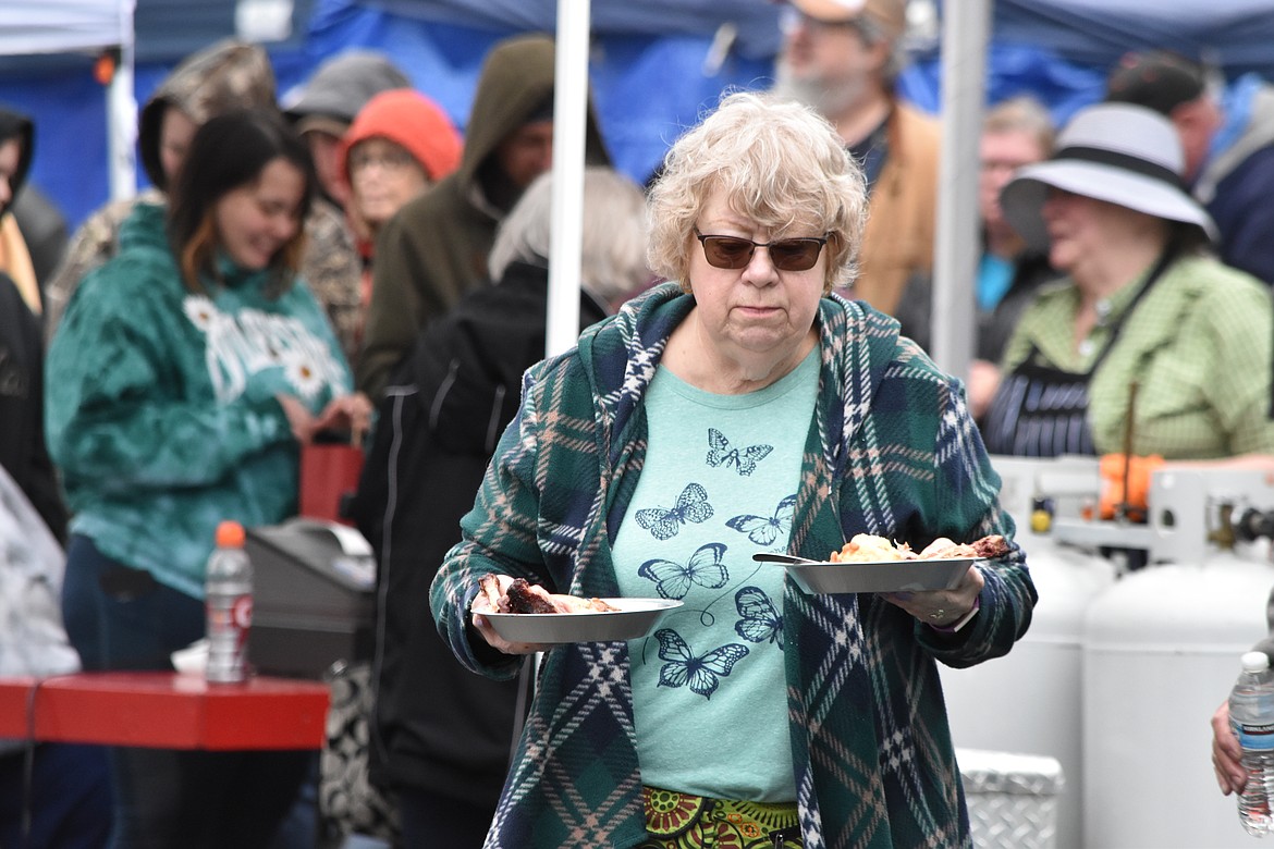 Dozens of people turned out to the event to get a couple plates of the unquestionably cheap food.