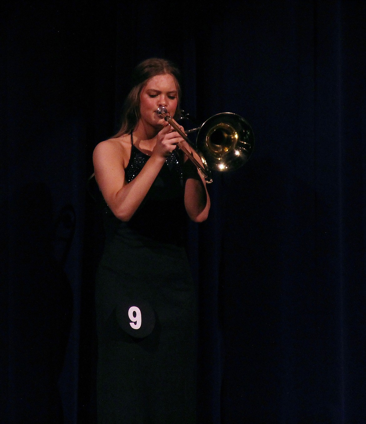 Evelynn Chaney performs on the trombone during the talent portion of the DYW 2022 program.