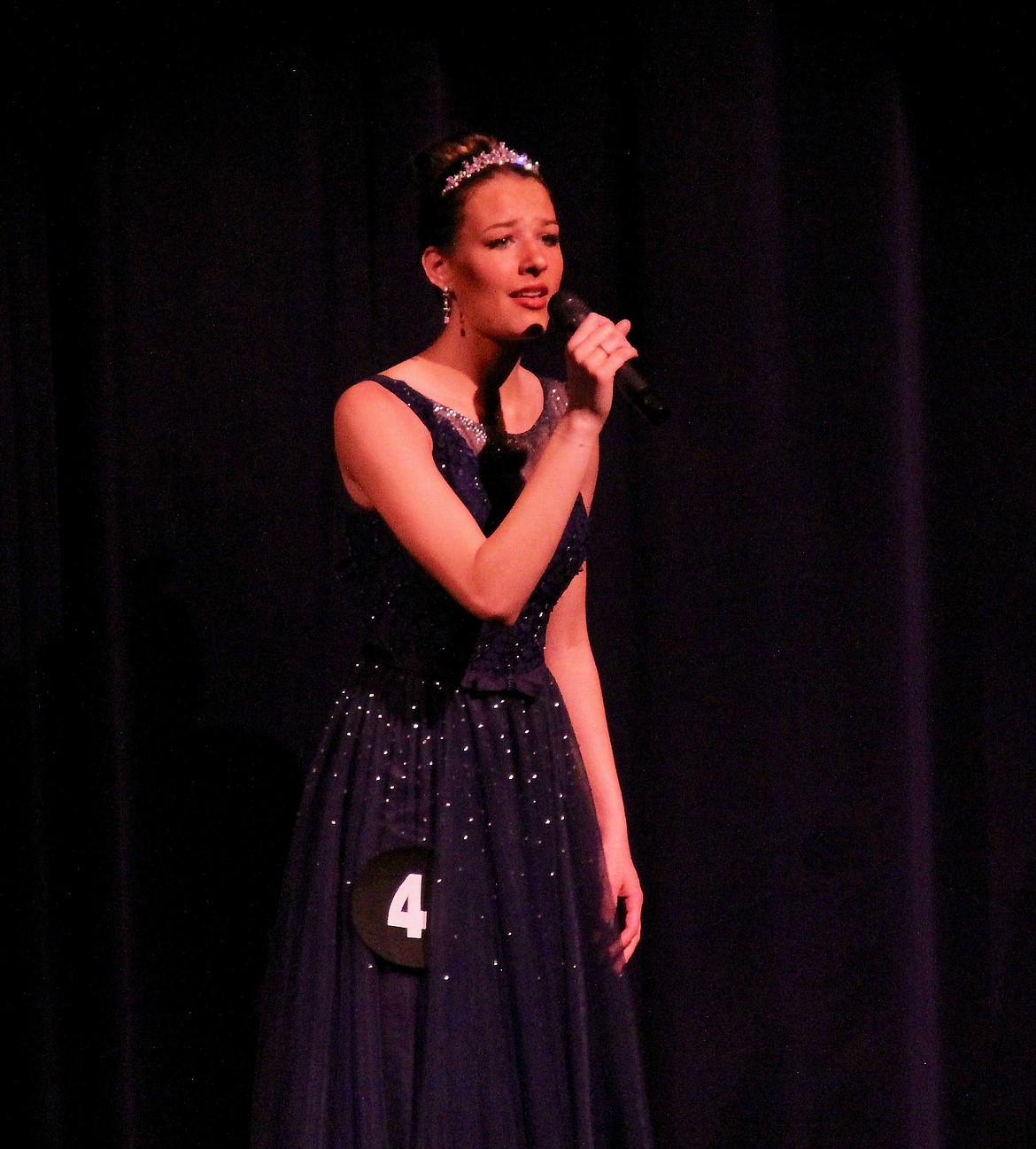 Margaret Weaver sings during the talent portion of the DYW 2022 program.