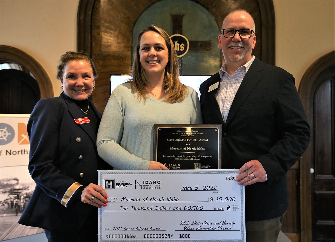 The Museum of North Idaho was presented with the Sister Alfreda Elsensohn Award at Fort Sherman Chapel on May 5. Given annually by the Idaho Humanities Council and Idaho State Historical Society, the recognition includes $10,000. From left, ISHS Executive Director Janet Gallimore, Museum of North Idaho Executive Director Britt Thurman and David Pettyjohn, IHC executive director.