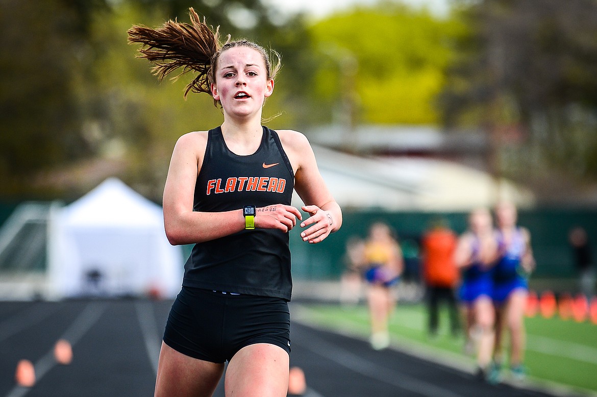 Flathead's Lilli Rumsey Eash crosses the finish line in the girls 3200 meter run at the Archie Roe Invitational track meet at Legends Stadium on Saturday, May 7. (Casey Kreider/Daily Inter Lake)