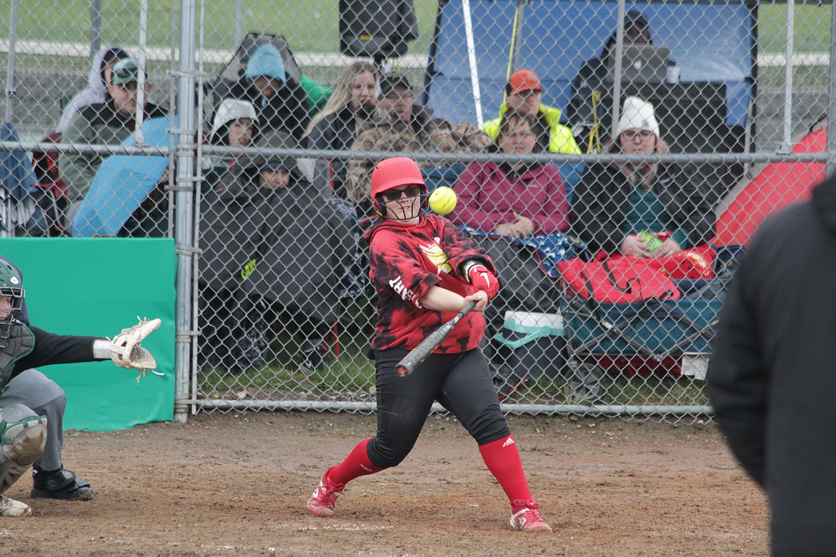 MARK NELKE/Press
Elizabeth Dysart of Sandpoint fights off a pitch vs. Lakeland in the second game Saturday at Rathdrum.