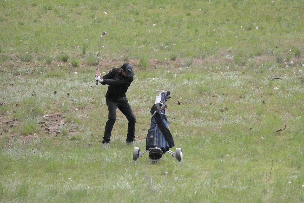 Plains golfer Drew Carey shoots out of the rough during the Plains High Invitational golf tourney this past Friday at Plains Golf Course.  (Chuck Bandel/VP-MI)