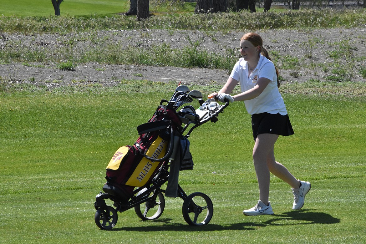 Freshman Rhylee Humphrey pushes on to the next hole during Pod 7 at Moses Lake Golf Club.