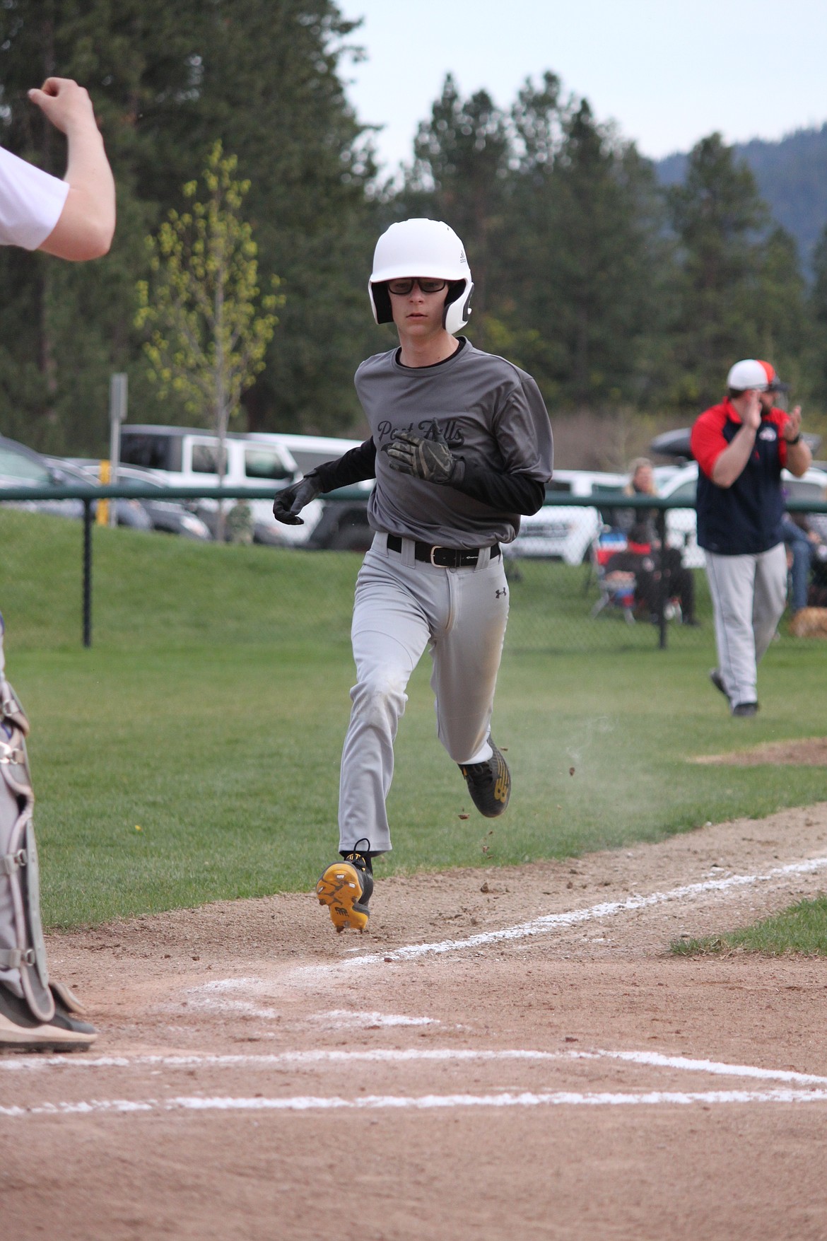 Courtesy photo
Colton Gookin of Post Falls scores a run against Coeur d'Alene No. 2 in a Little League Juniors game on May 4.