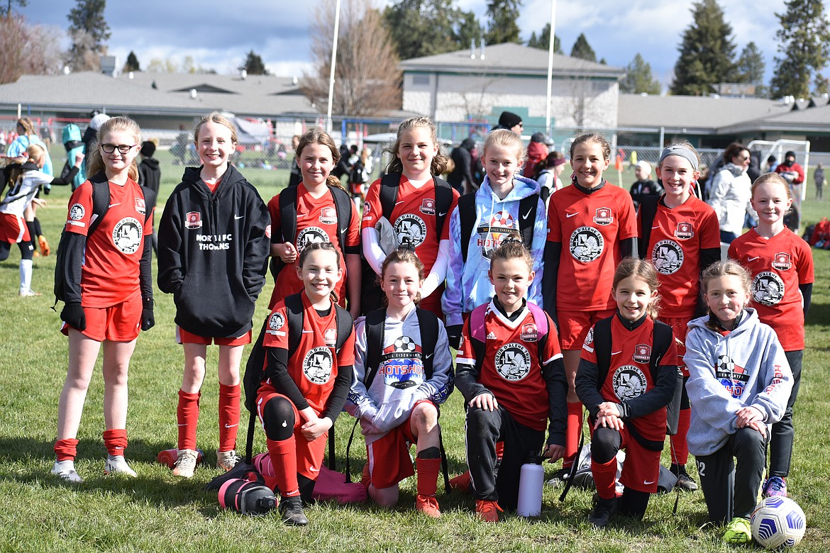 Courtesy photo
The Thorns North FC 11 Girls Green soccer team tied for third place in the recent Bill Eisenwinter Hot Shot Tournament with a 1-2 record. The Thorns' win was against Hells Canyon FC, coming from behind to win 4-2. The Thorns' four goals came from Olivia Hynes, Mille Meyer with an assist from Payton Brennan, Zoe Lemmon with an assist from Olivia Hynes, and Kynleigh Rider with an assist from Millie Meyer. In the front row from left are Ella Linder, MacKenzie Dolan, Ava Langer, Gracie McVey and Avery Thompson; and back row from left, Kynleigh Rider, Zoe Lemmon, Sierra Jones, Constance Ovendale, Amelia Liddiard, Millie Meyer, Payton Brennan and Olivia Hynes.