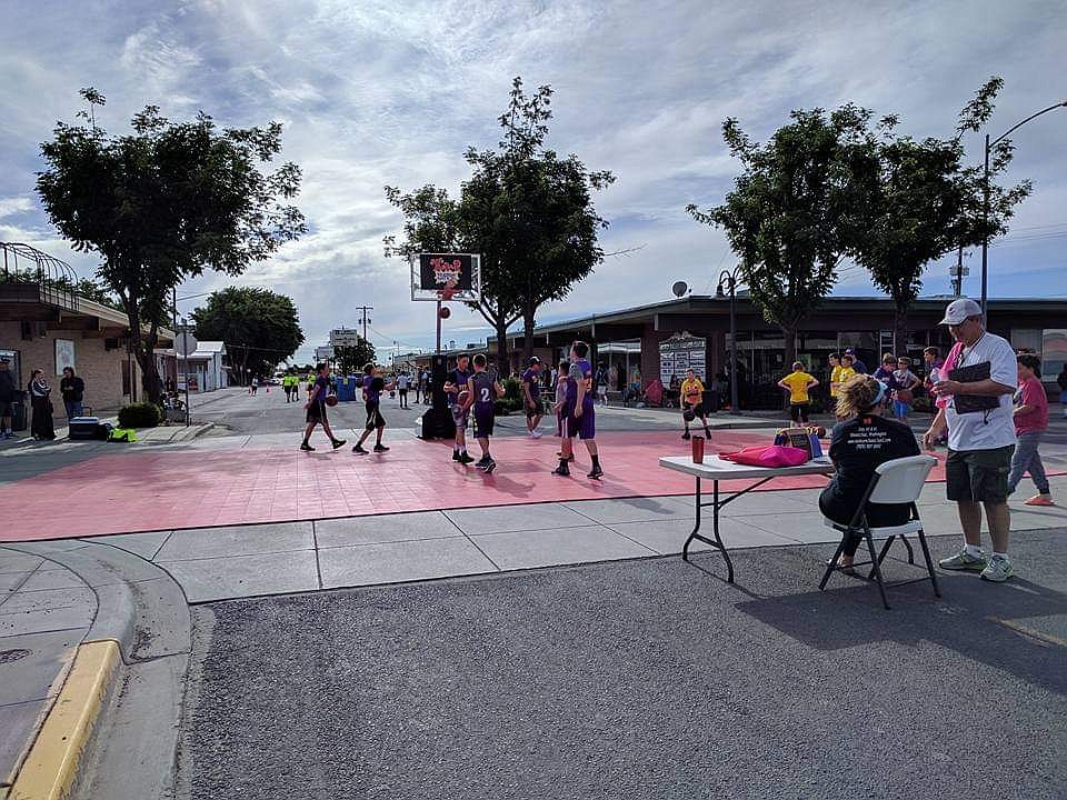 Basketball players fill the streets of Quincy during a previous Dru Gimlin 3 on 3 tournament. The tournament returns for 2022, and organizers are looking for volunteer help for this year's tournament.