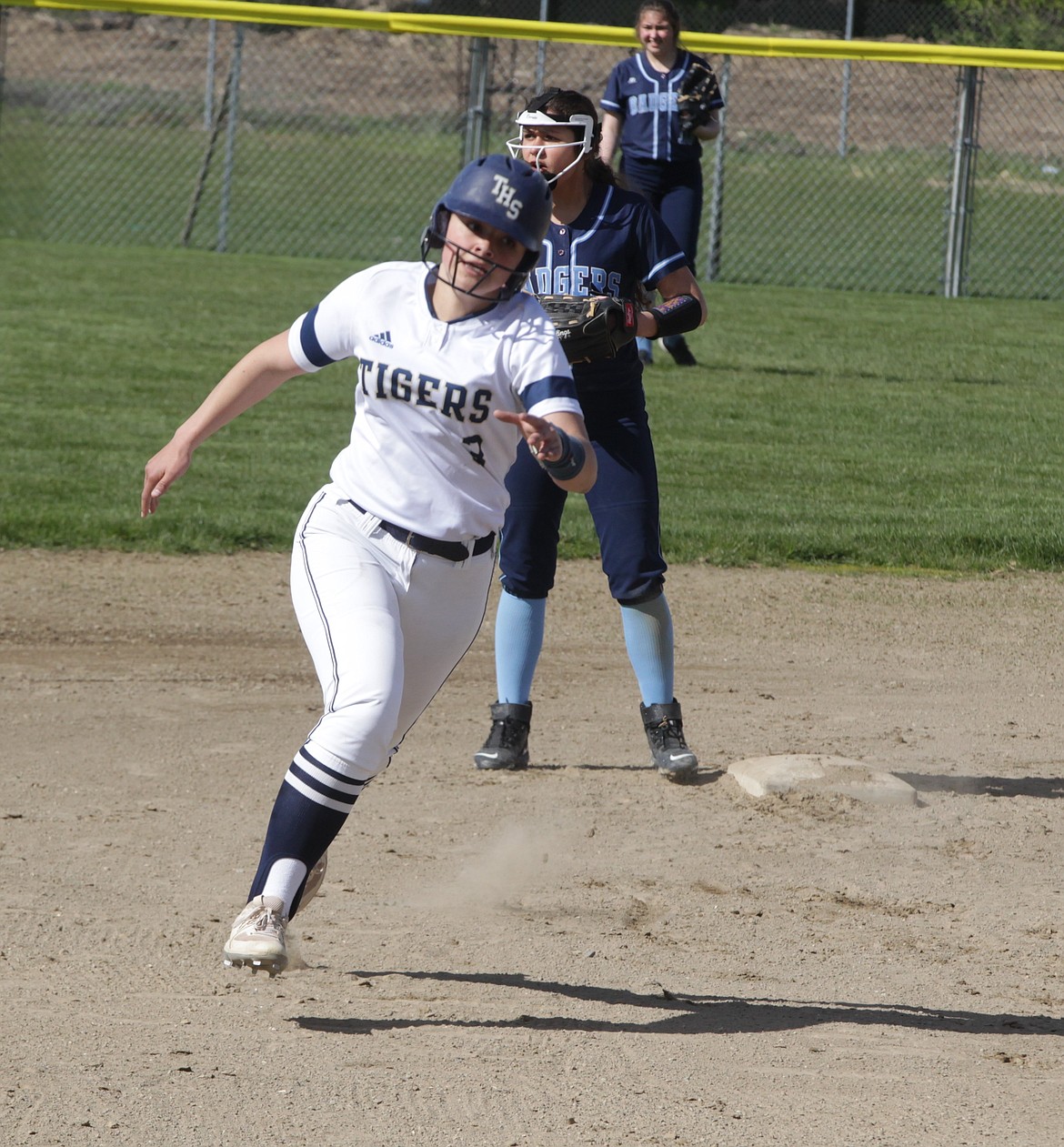 JASON ELLIOTT/Press
Timberlake sophomore Logan Walsh rounds second base on the way to third during the first inning of Wednesday's 3A District 1 softball opening round game against Bonners Ferry at Timberlake High.